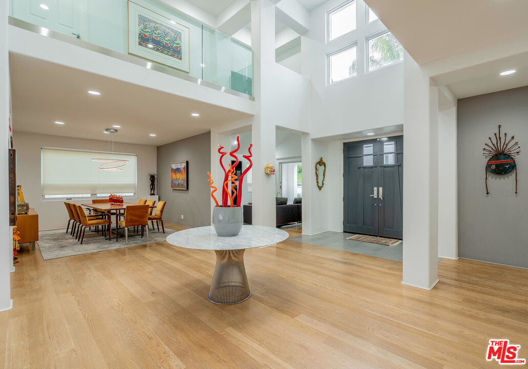 24050 Park Casino Calabasas, CA 91302 - Photo 8 of 43 a living room with furniture and a table