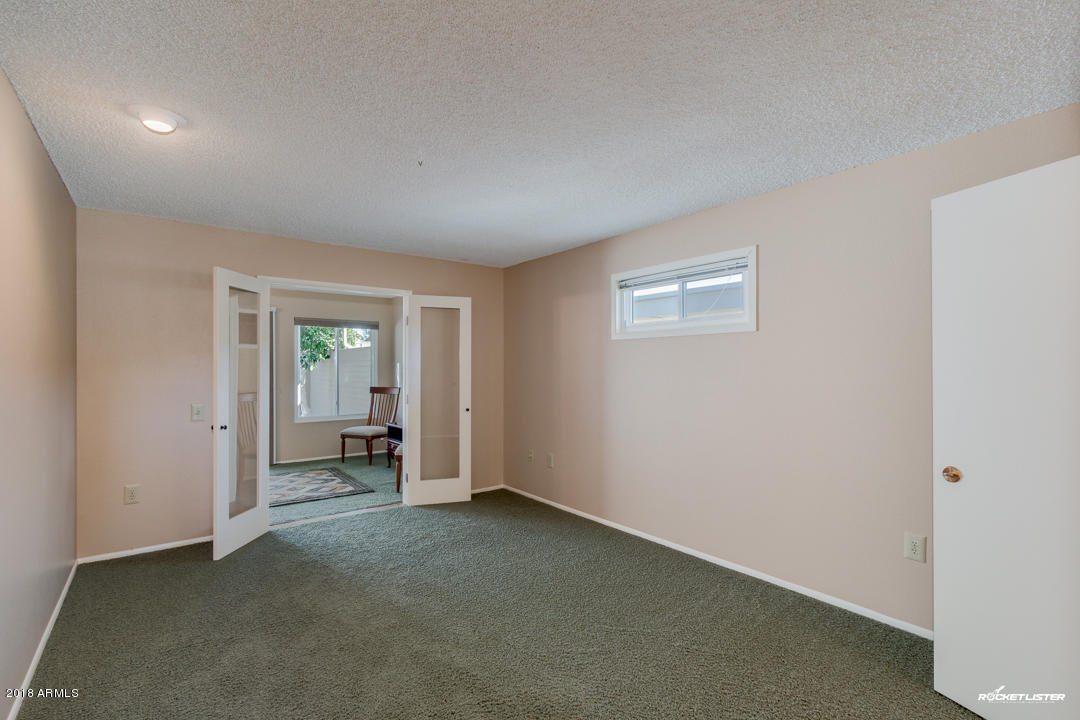 10020 West Royal Oak Road, Unit E Sun City, AZ 85351 - Photo 20 of 31 Master Bedroom
