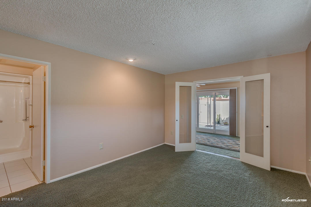 10020 West Royal Oak Road, Unit E Sun City, AZ 85351 - Photo 21 of 31 Master Bedroom