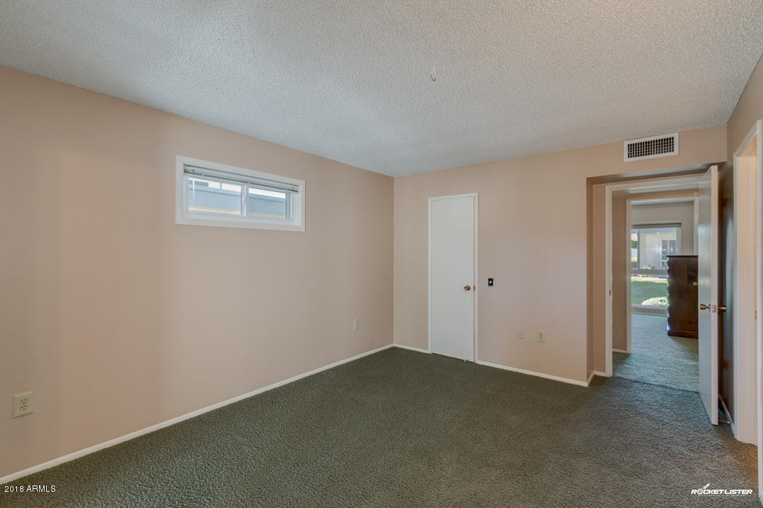 10020 West Royal Oak Road, Unit E Sun City, AZ 85351 - Photo 22 of 31 Master Bedroom
