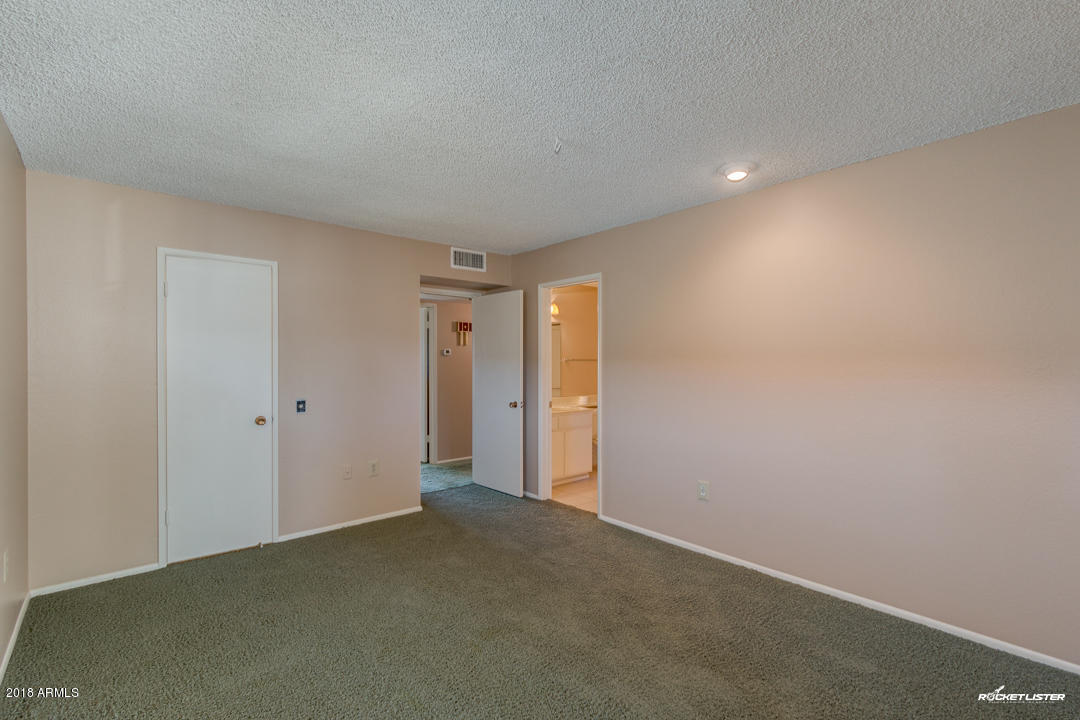 10020 West Royal Oak Road, Unit E Sun City, AZ 85351 - Photo 23 of 31 Master Bedroom