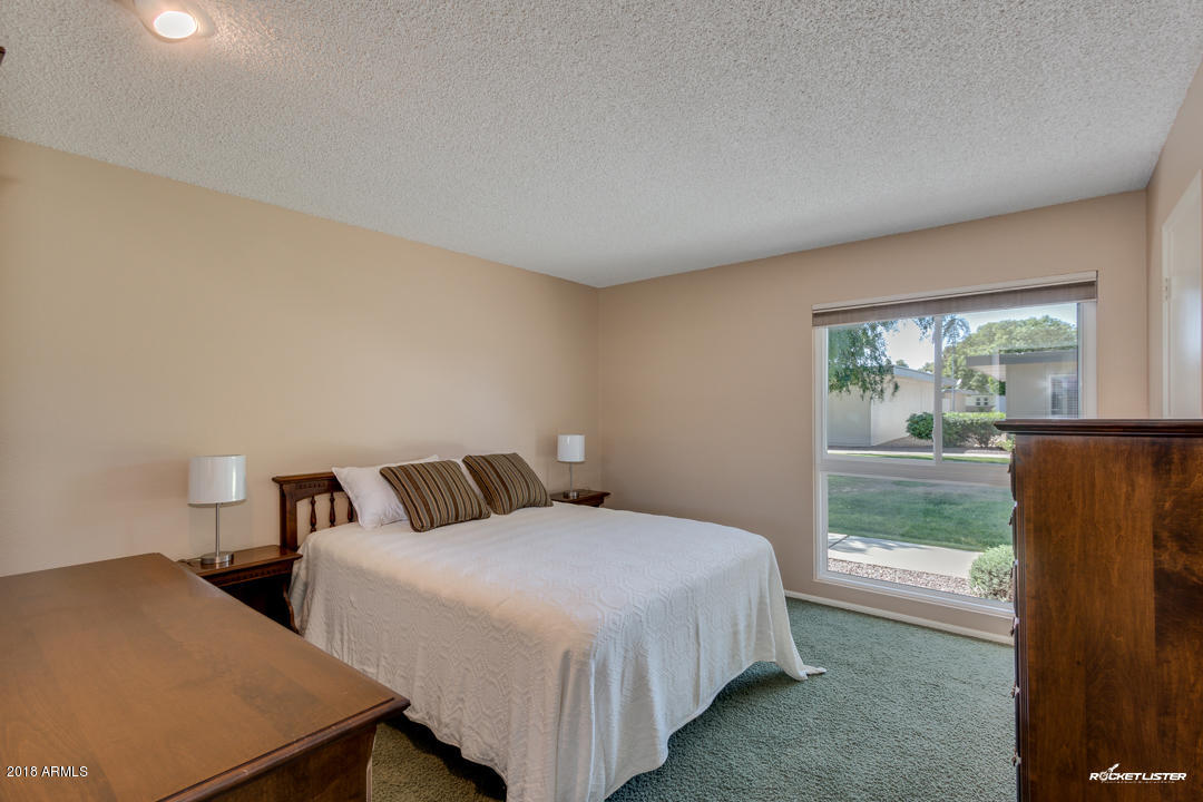 10020 West Royal Oak Road, Unit E Sun City, AZ 85351 - Photo 25 of 31 Guest Bedroom