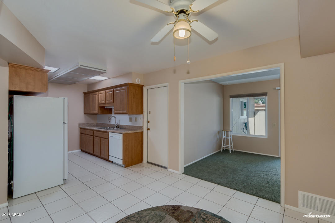 10020 West Royal Oak Road, Unit E Sun City, AZ 85351 - Photo 8 of 31 Kitchen-Entrance to AZ Room