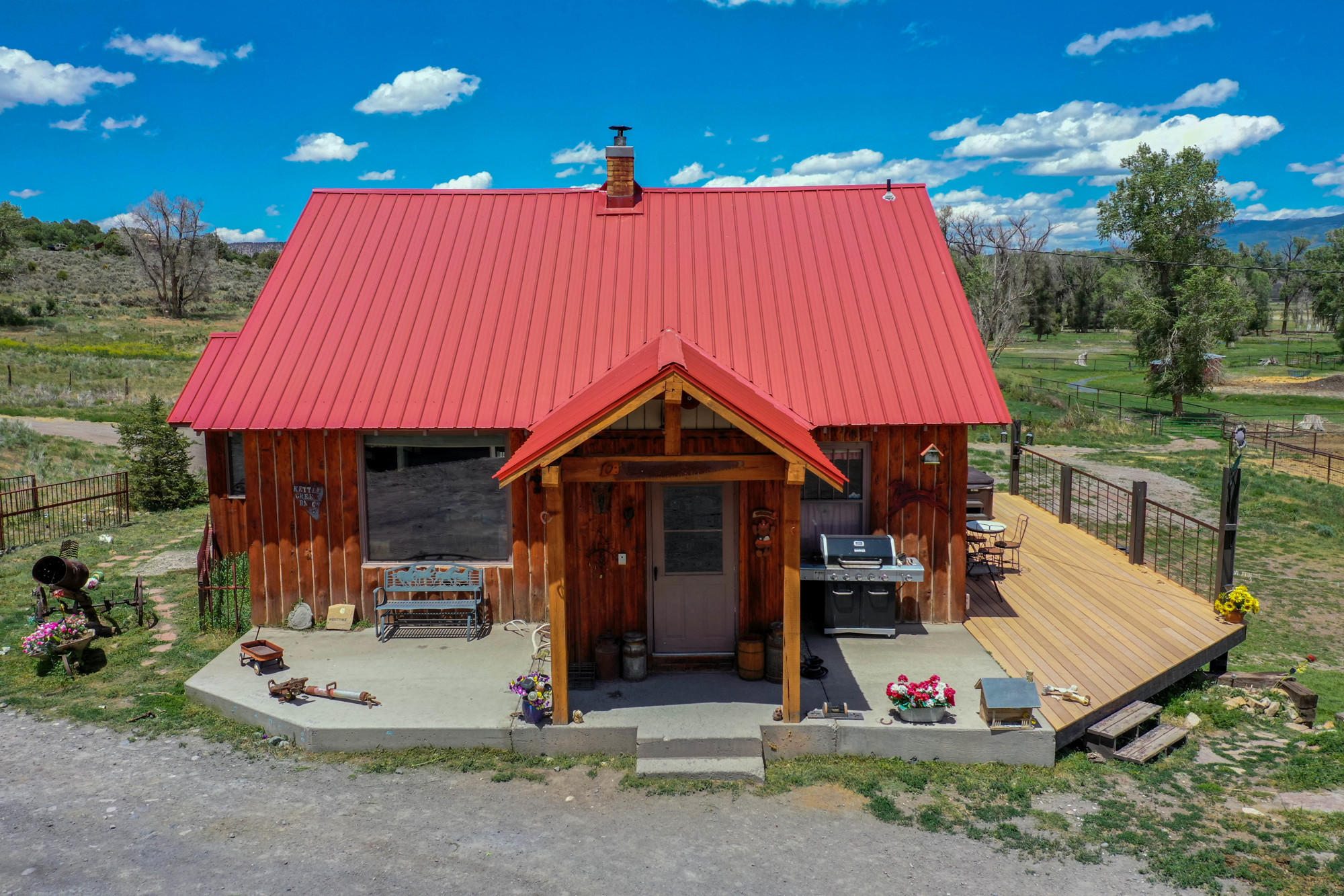 5276 County Road 23 Ridgway, CO 81432 - Photo 19 of 33 a front view of a house with garden