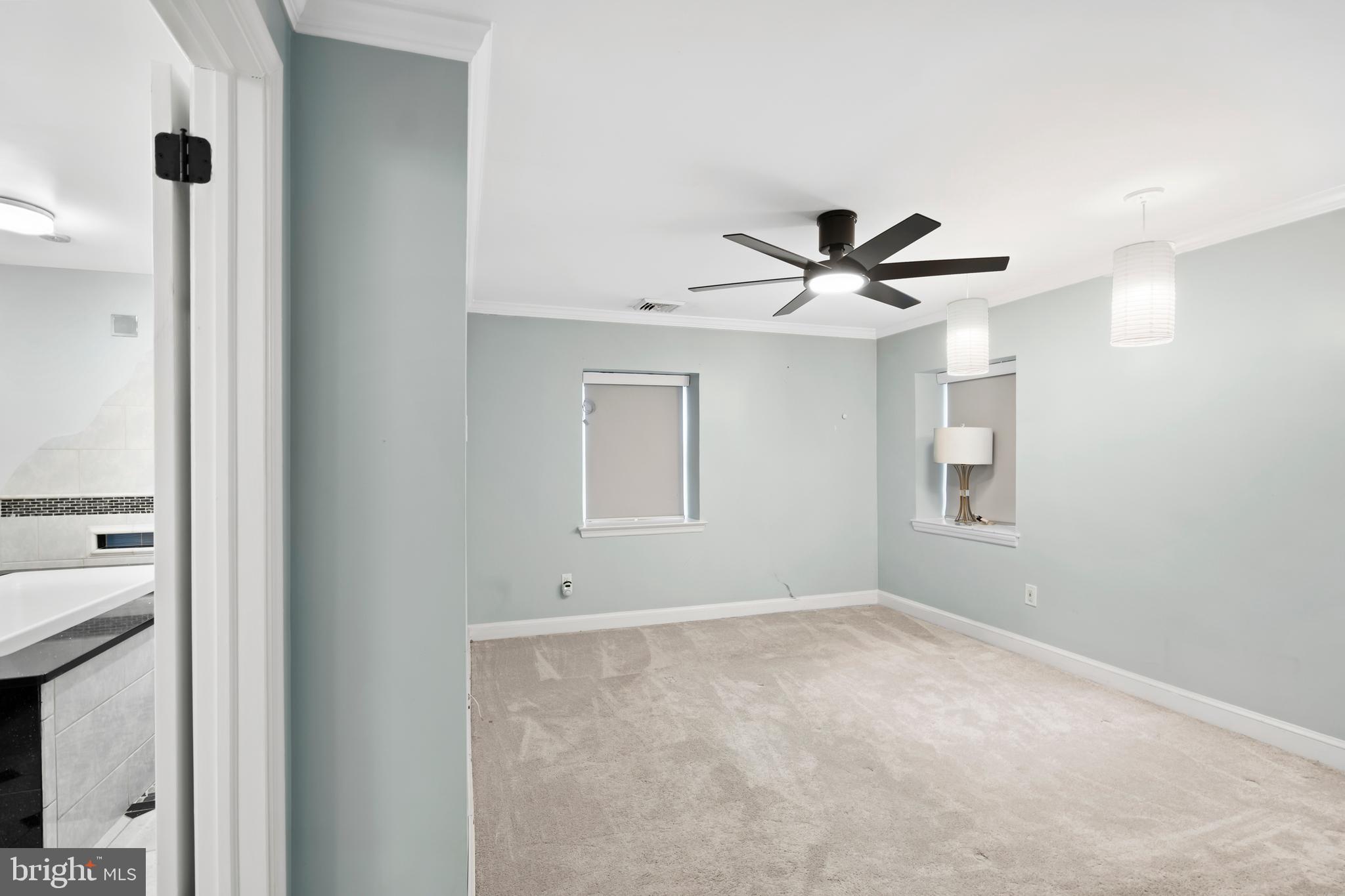 1028 Foss Avenue Drexel Hill, PA 19026 - Photo 22 of 48 a view of an empty room with a ceiling fan
