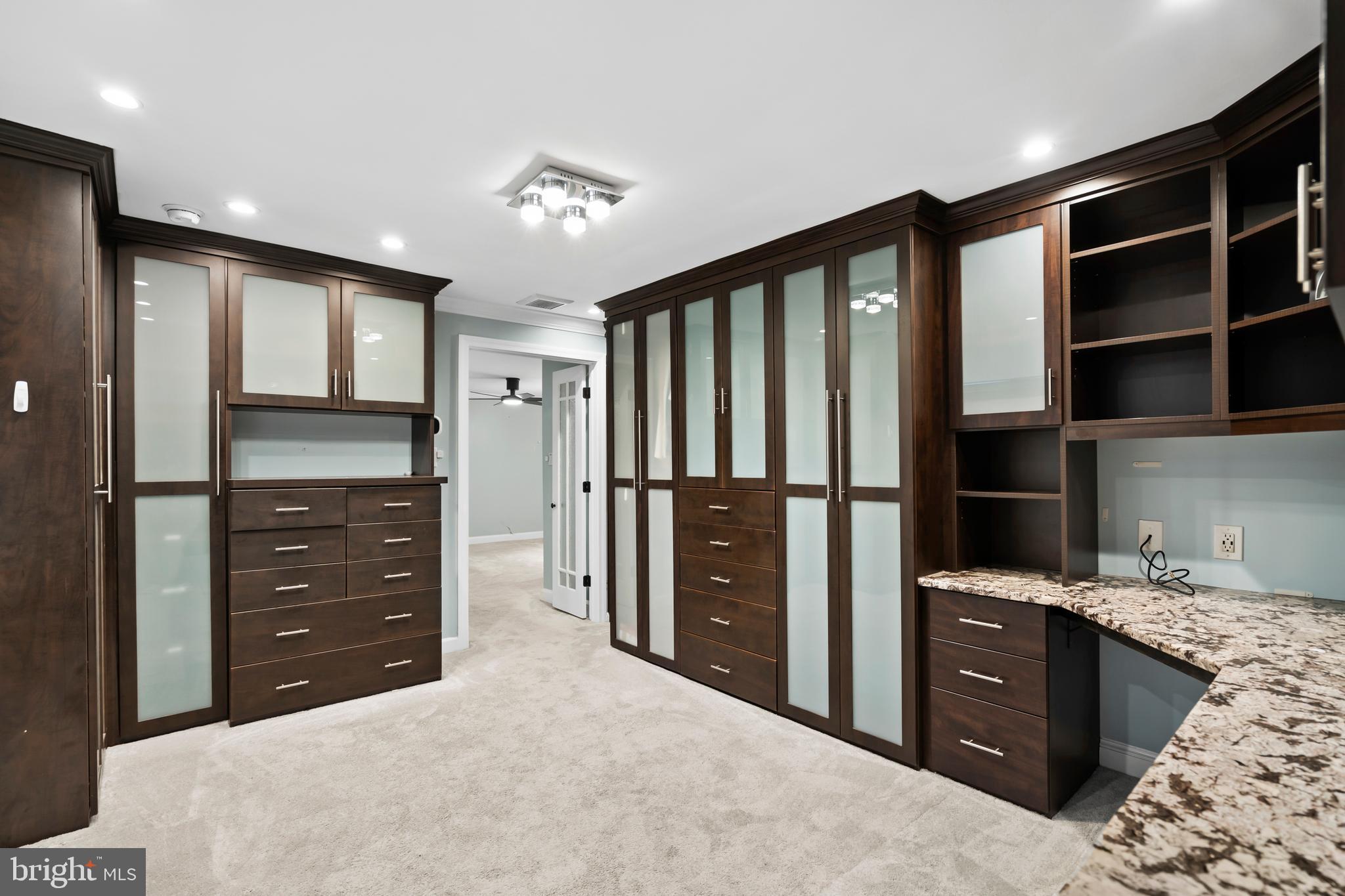 1028 Foss Avenue Drexel Hill, PA 19026 - Photo 23 of 48 a large bedroom with a dresser and a large window