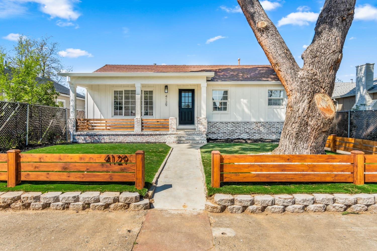 a front view of house with yard