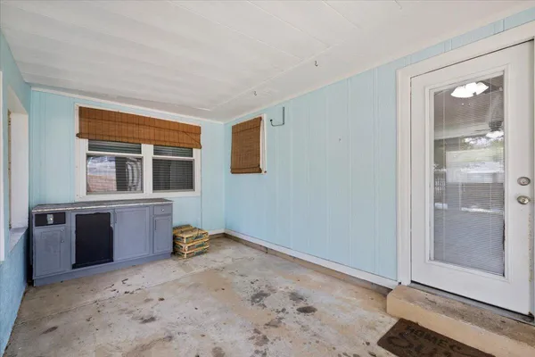 a room with a bed and a window