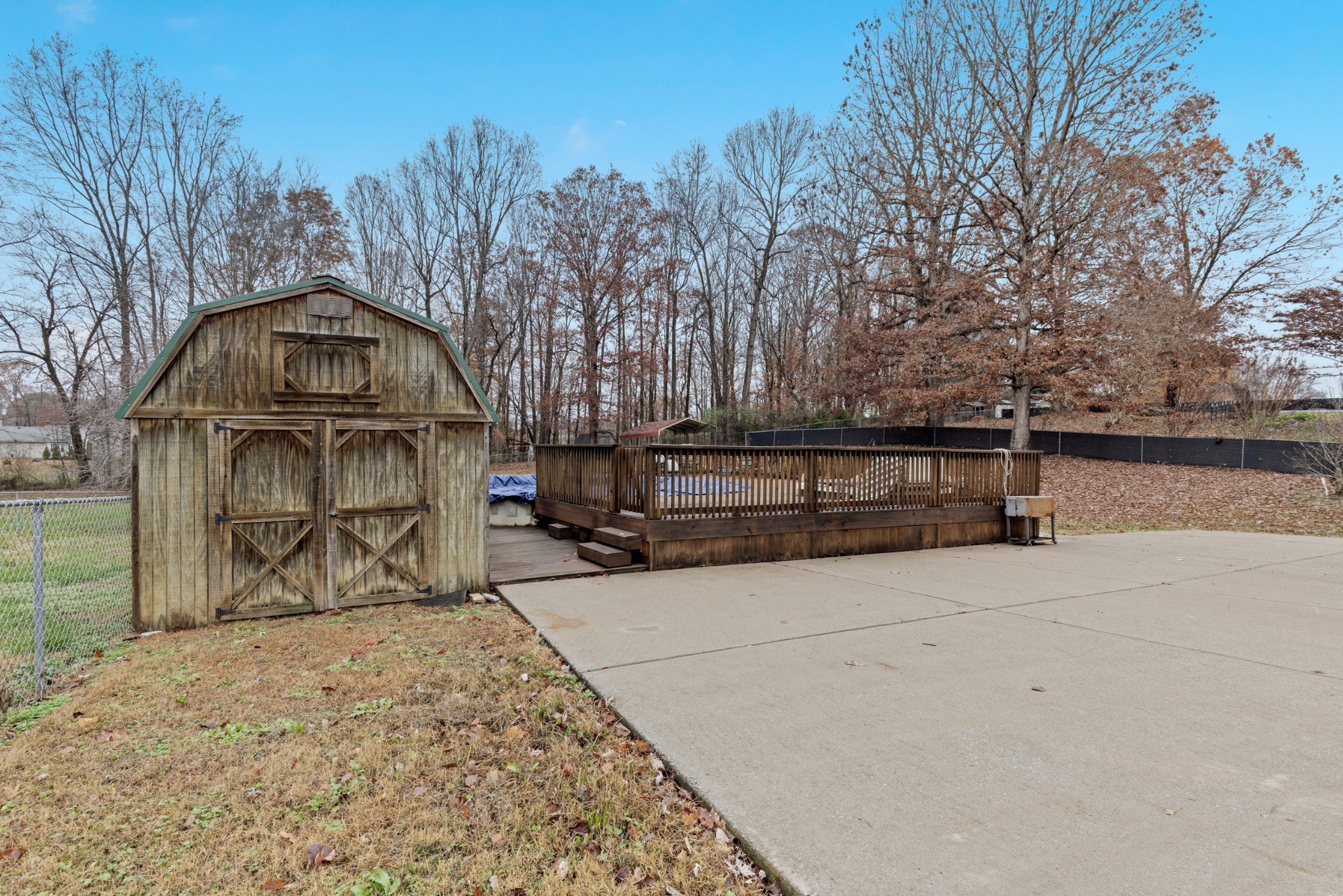 1069 Heatherwood Road Pleasant View, TN 37146 - Photo 15 of 45 a view of a yard with wooden fence