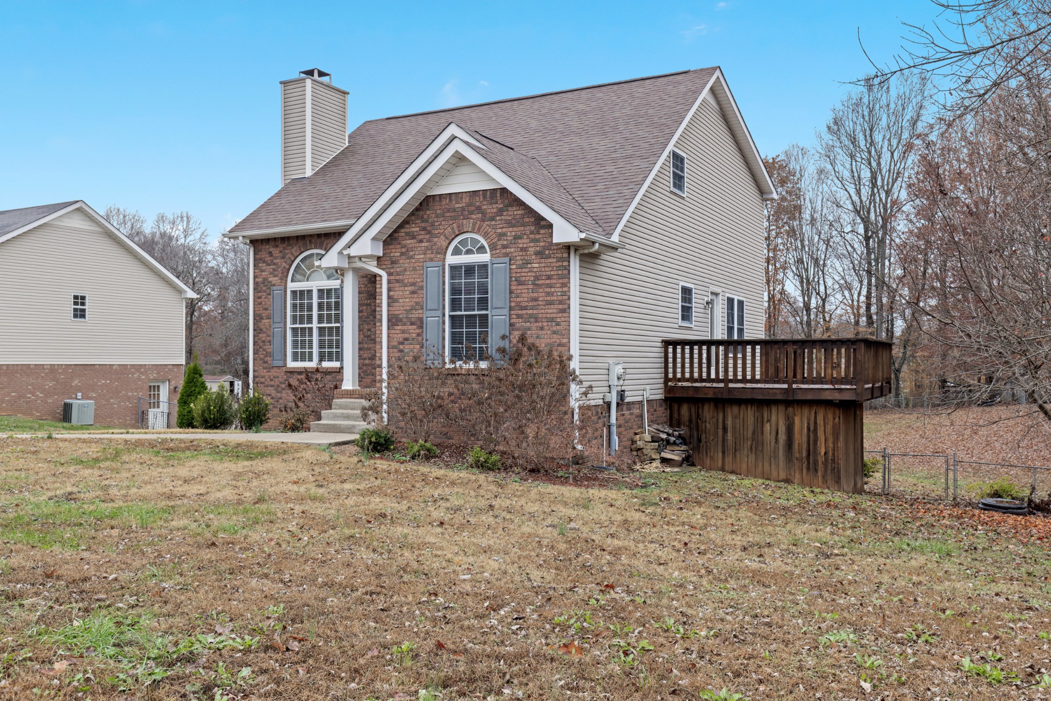 1069 Heatherwood Road Pleasant View, TN 37146 - Photo 2 of 45 a front view of a house with a yard