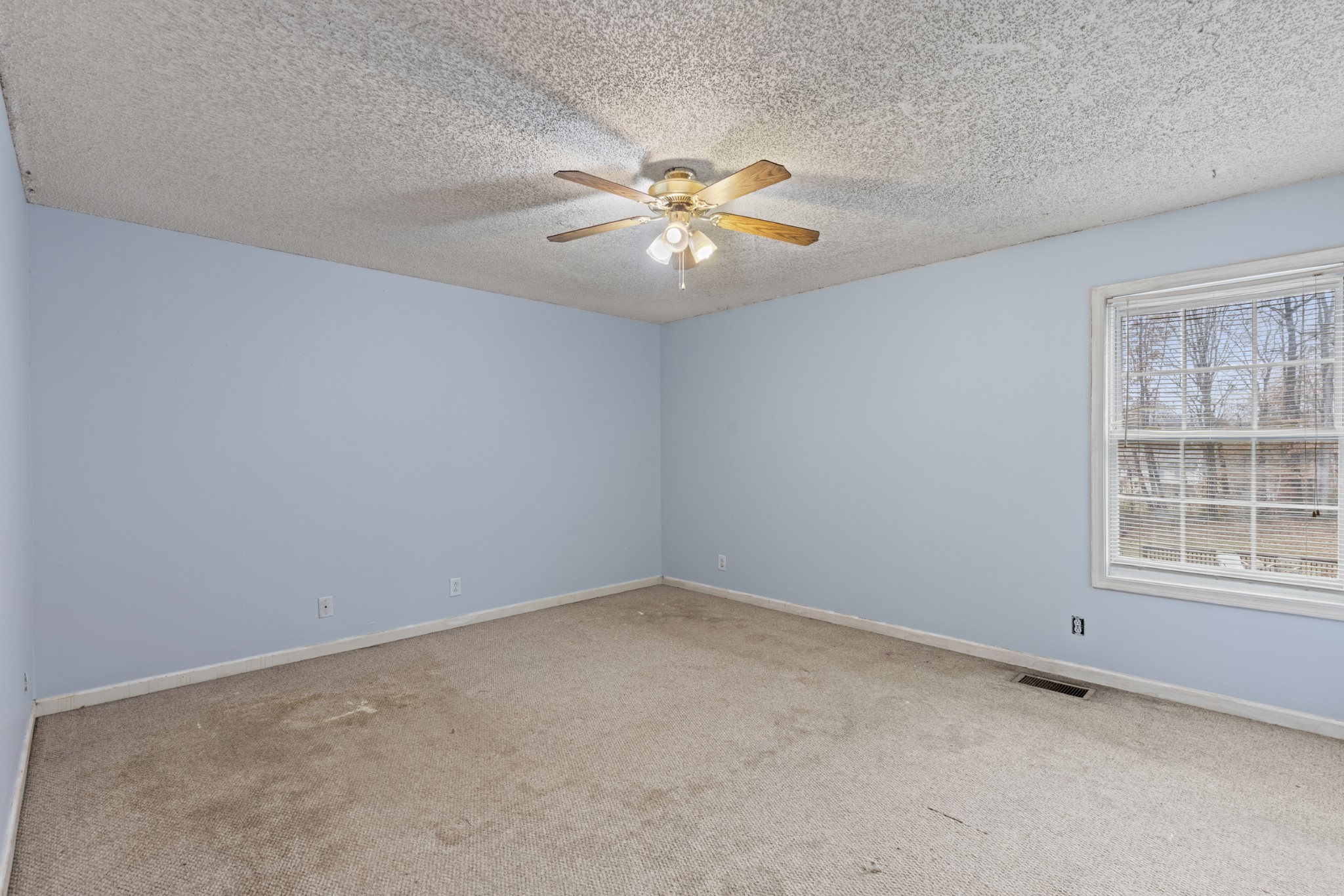 1069 Heatherwood Road Pleasant View, TN 37146 - Photo 21 of 45 an empty room with a window and a fan
