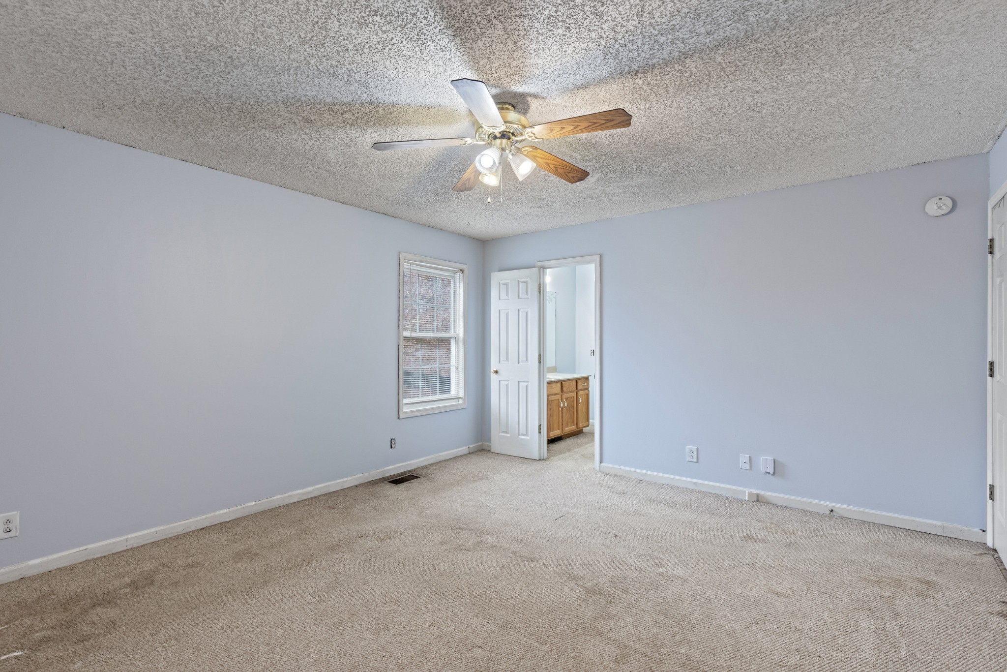 1069 Heatherwood Road Pleasant View, TN 37146 - Photo 22 of 45 an empty room with closet and a ceiling fan
