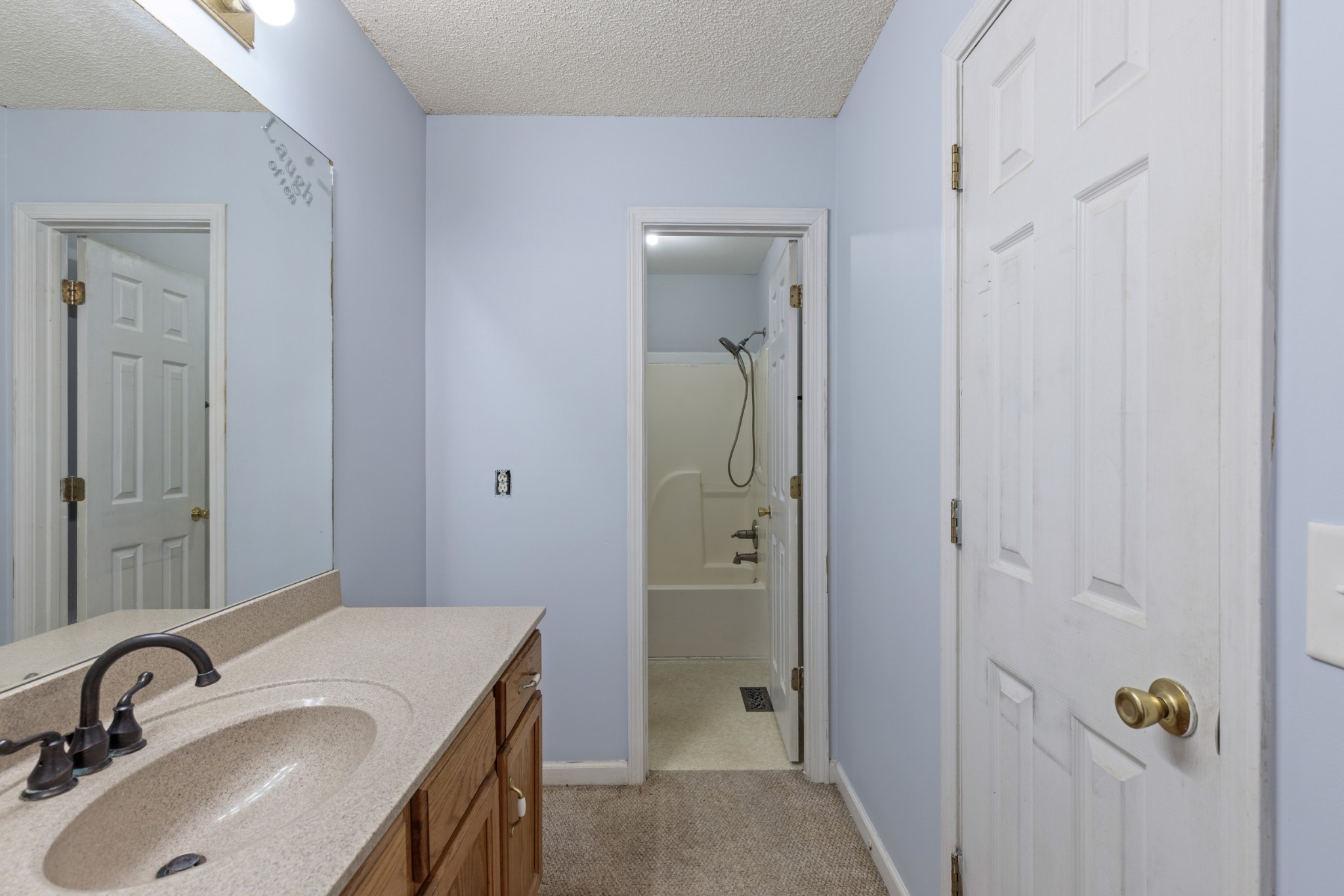 1069 Heatherwood Road Pleasant View, TN 37146 - Photo 25 of 45 a bathroom with a sink and a mirror