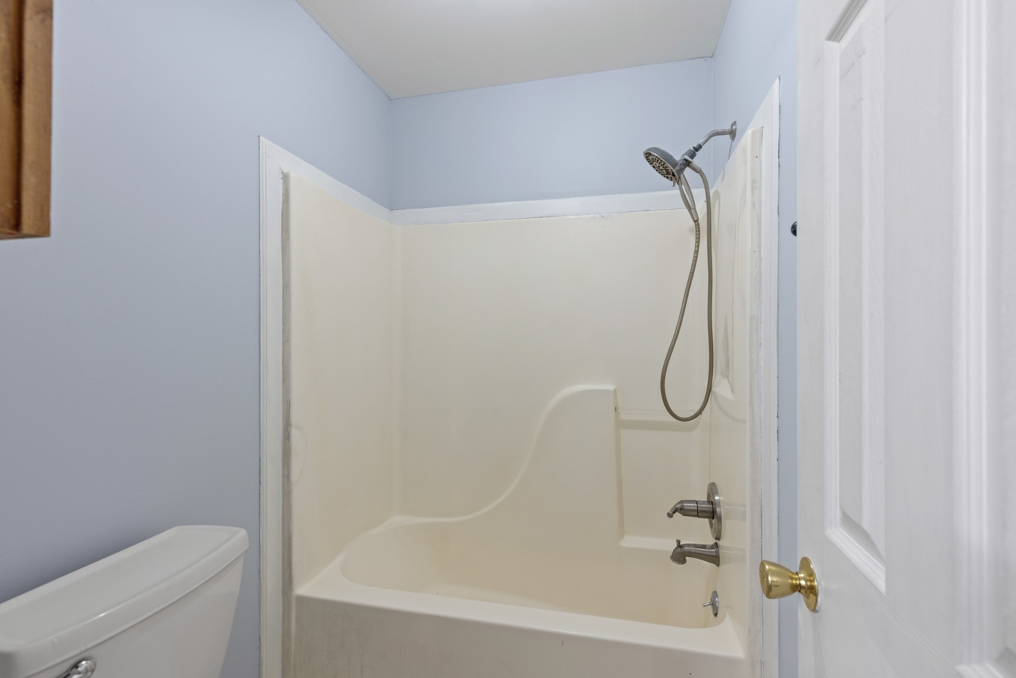 1069 Heatherwood Road Pleasant View, TN 37146 - Photo 26 of 45 a bathroom with a bath tub with a shower