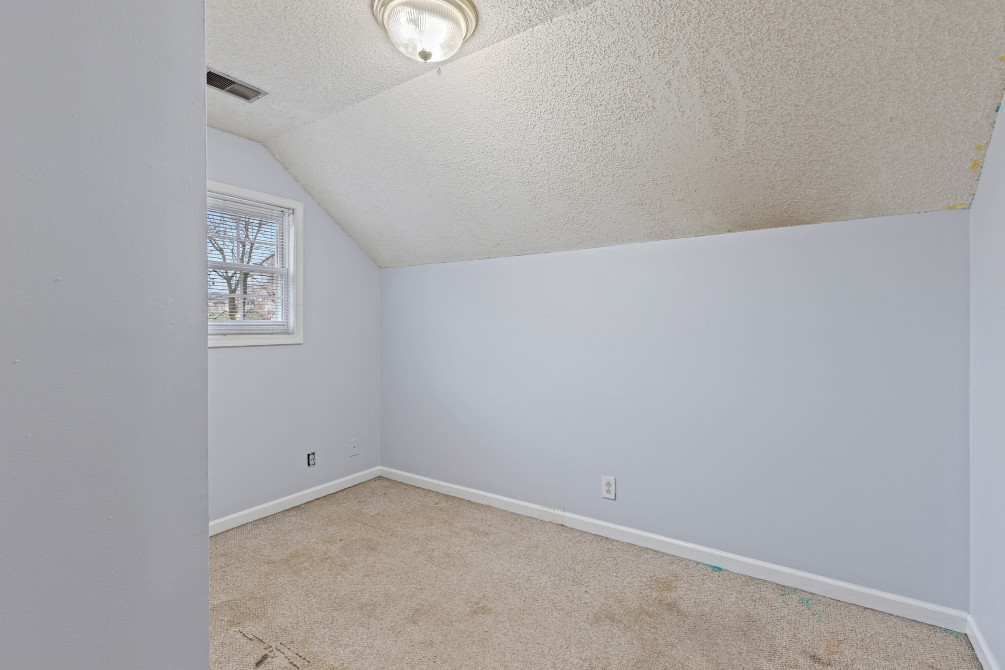 1069 Heatherwood Road Pleasant View, TN 37146 - Photo 33 of 45 an empty room with windows
