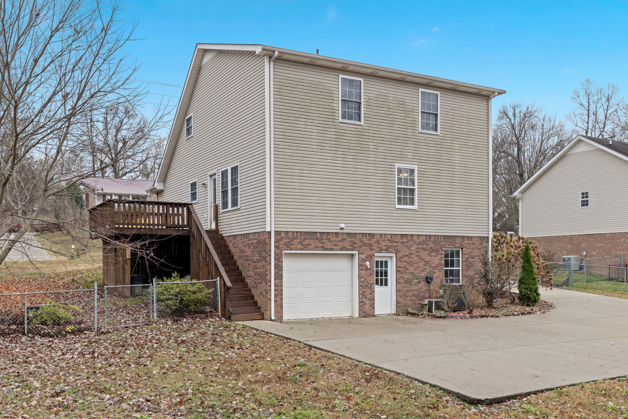 1069 Heatherwood Road Pleasant View, TN 37146 - Photo 45 of 45 a front view of a house with a garage