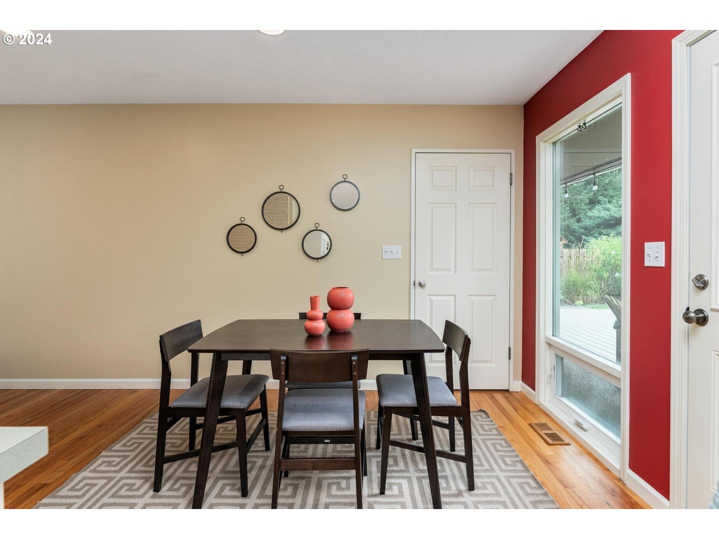 12250 Southwest Tremont Street Portland, OR 97225 - Photo 15 of 38 a dining room with furniture and wooden floor
