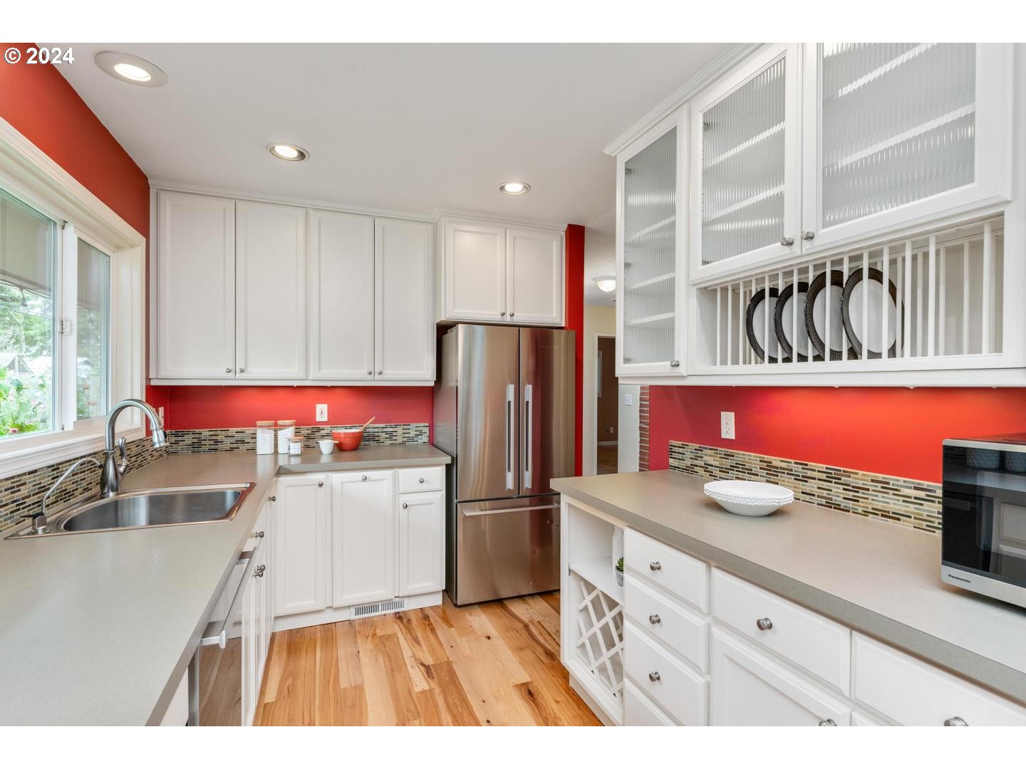 12250 Southwest Tremont Street Portland, OR 97225 - Photo 20 of 38 a kitchen with refrigerator and cabinets