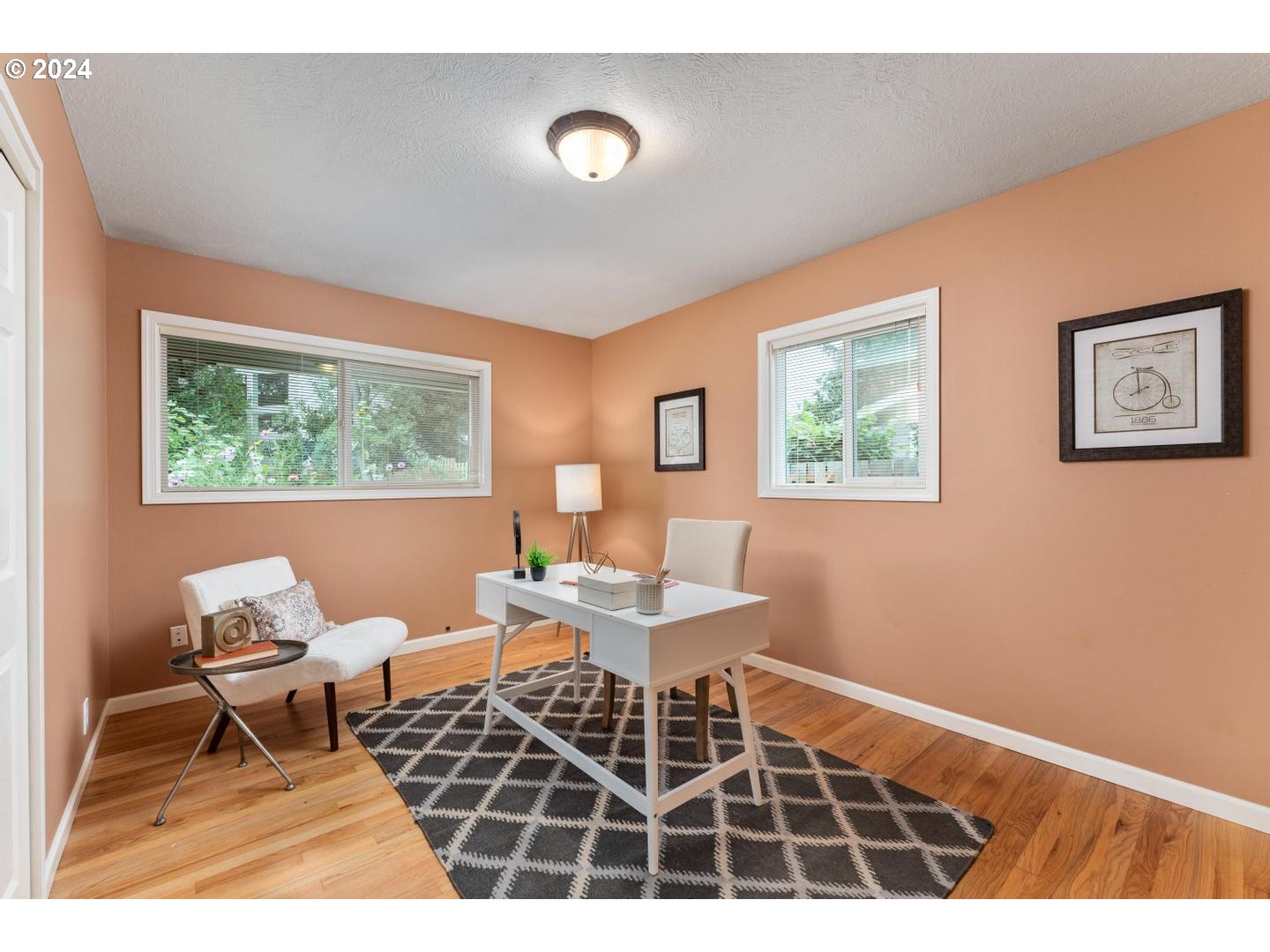 12250 Southwest Tremont Street Portland, OR 97225 - Photo 25 of 38 a living room with a rug and a window