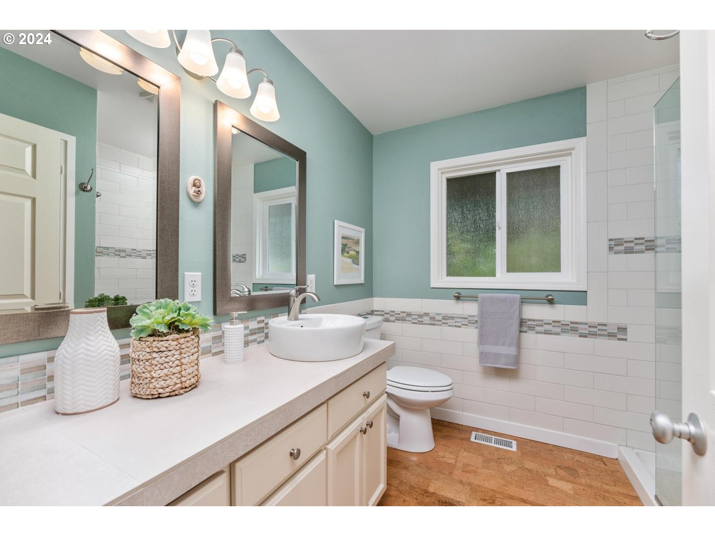 12250 Southwest Tremont Street Portland, OR 97225 - Photo 28 of 38 a bathroom with a granite countertop sink mirror and toilet