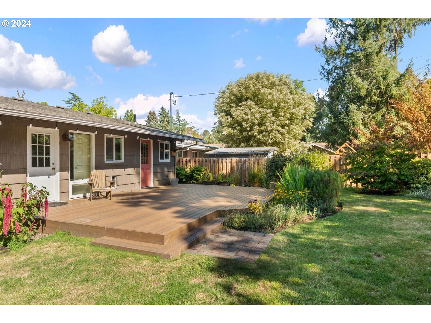 12250 Southwest Tremont Street Portland, OR 97225 - Photo 34 of 38 a view of a house with backyard and sitting area
