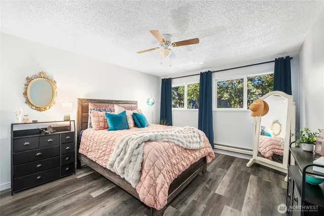 a bedroom with a bed and window