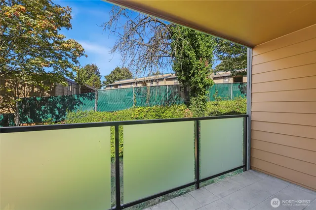 a view of swimming pool from a balcony