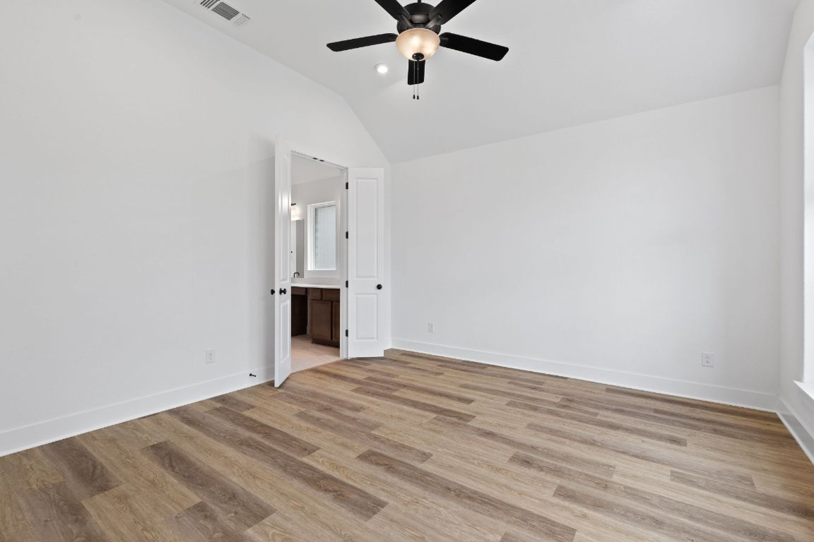 425 Hickory Springs Trail Georgetown, TX 78628 - Photo 17 of 35 Primary Bedroom with elevated ceiling