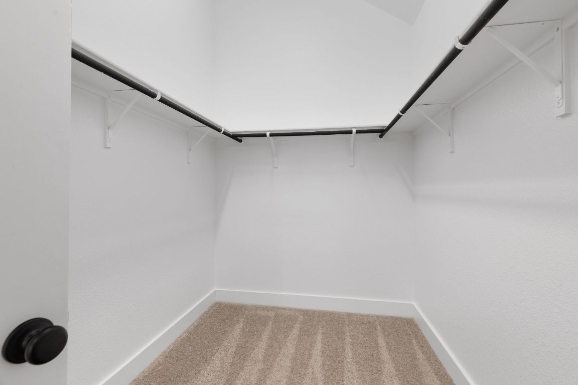 425 Hickory Springs Trail Georgetown, TX 78628 - Photo 21 of 35 Walk-in closet in Primary Bedroom