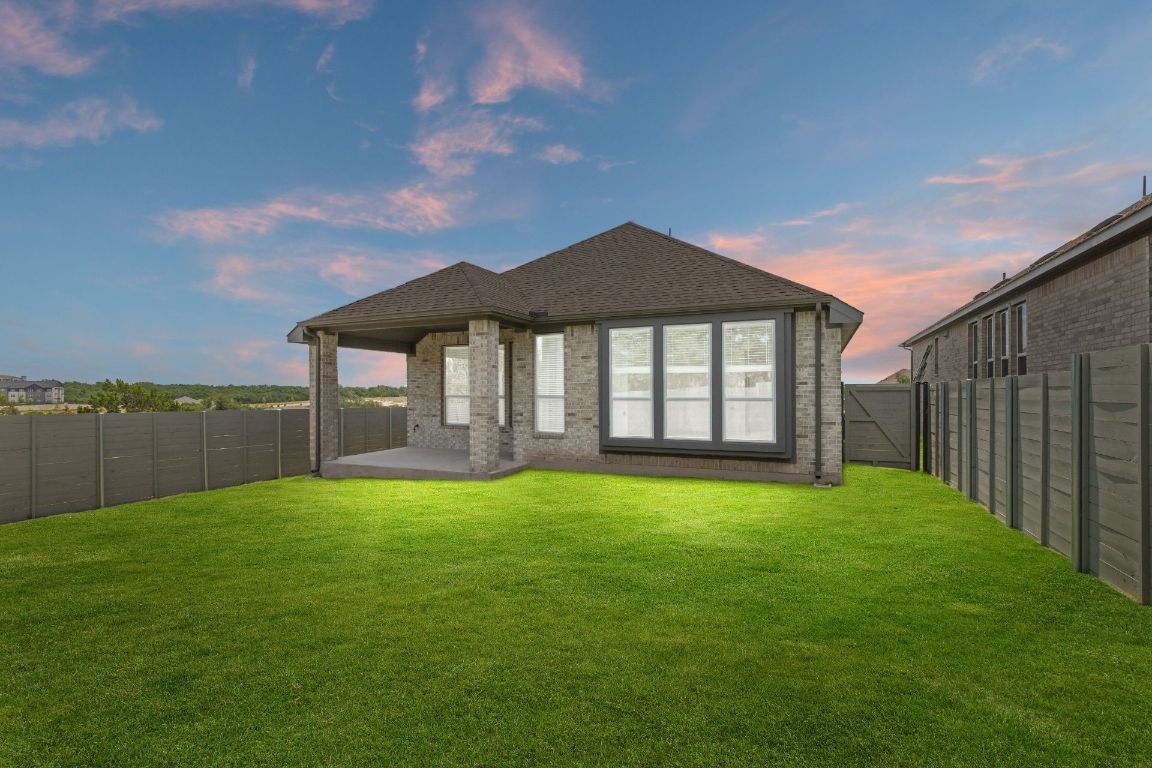 425 Hickory Springs Trail Georgetown, TX 78628 - Photo 23 of 35 Rear of Home and Private Backyard