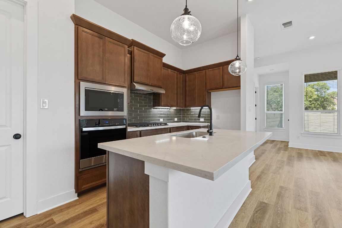 425 Hickory Springs Trail Georgetown, TX 78628 - Photo 7 of 35 Large Center Island in Kitchen