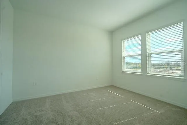 an empty room with a window