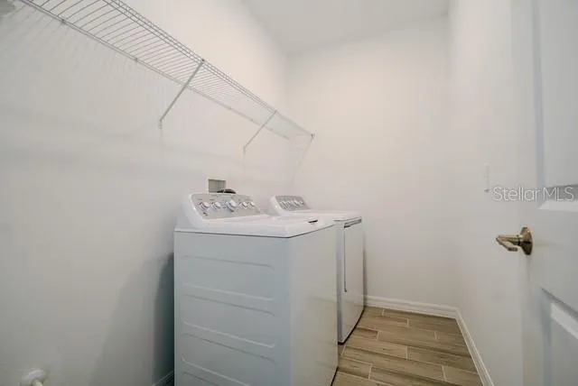a bathroom with a sink and vanity