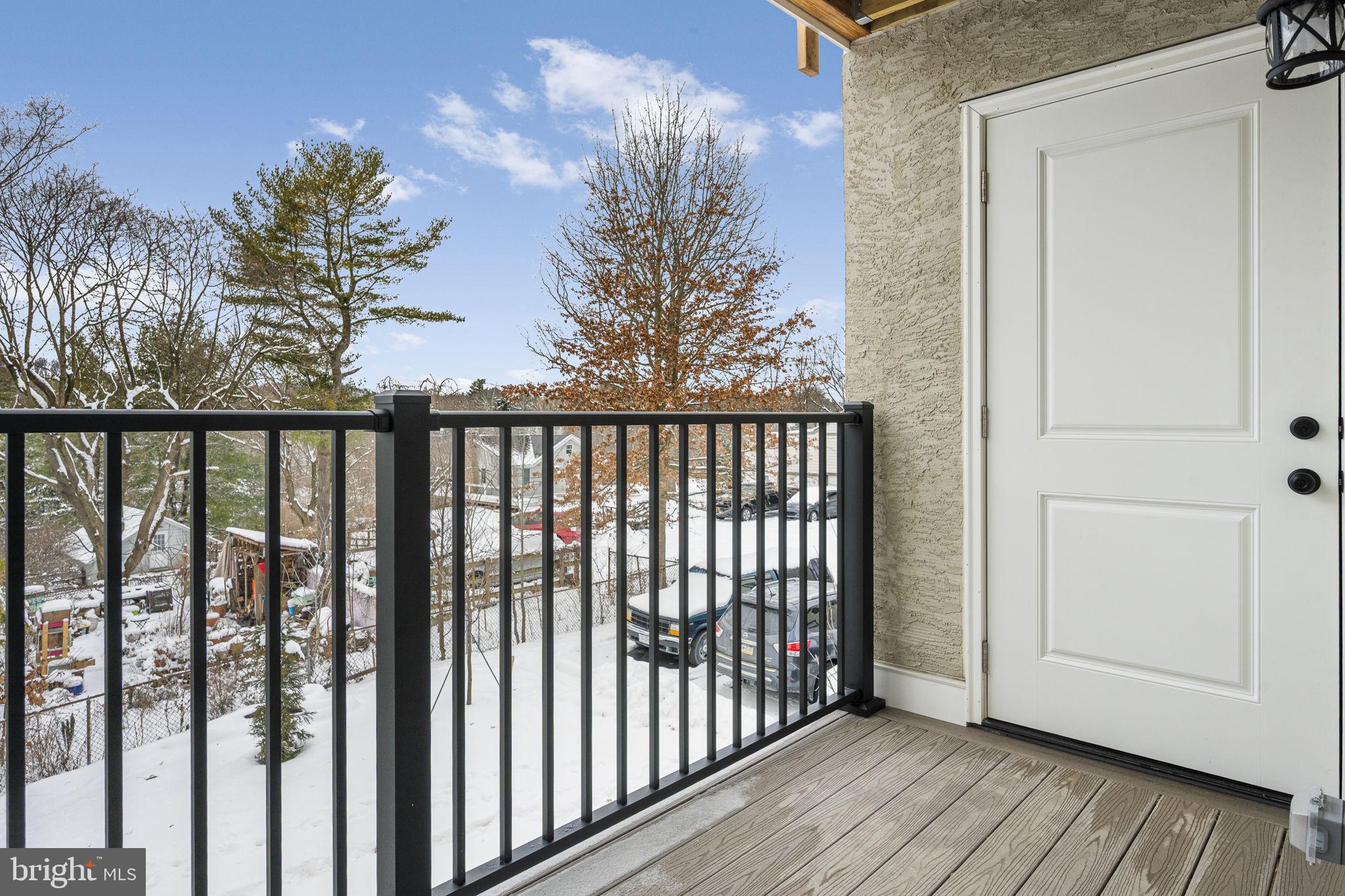 2185 Kimberton Road, Unit 5 Phoenixville, PA 19460 - Photo 14 of 36 a view of a porch with wooden floor and fence