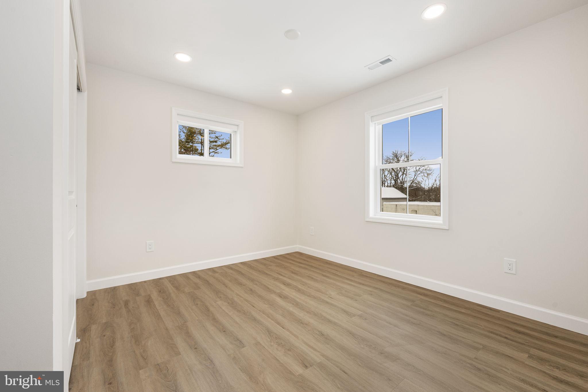 2185 Kimberton Road, Unit 5 Phoenixville, PA 19460 - Photo 15 of 36 a view of a room with wooden floor and window