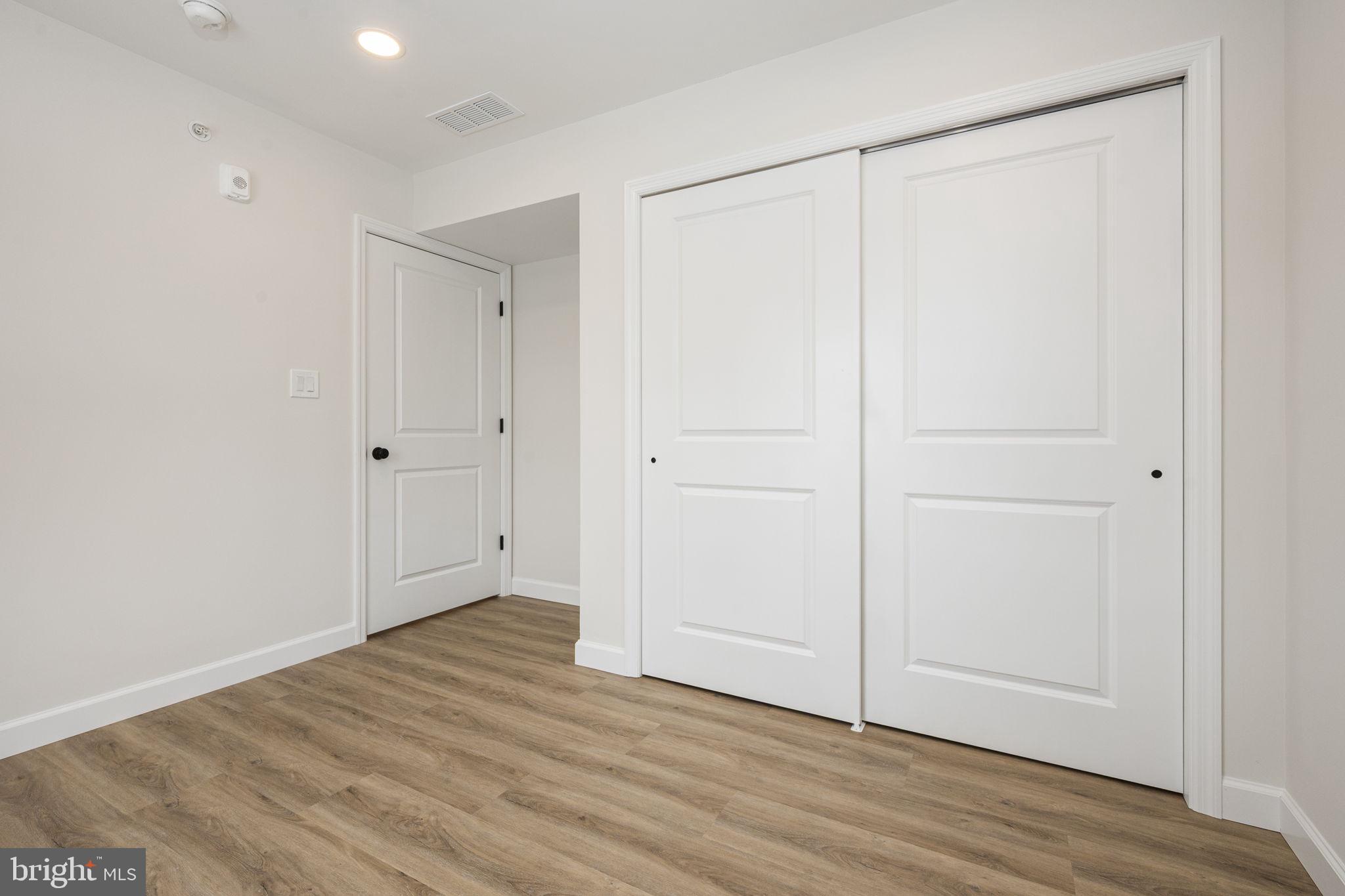 2185 Kimberton Road, Unit 5 Phoenixville, PA 19460 - Photo 16 of 36 a view of an empty room with wooden floor