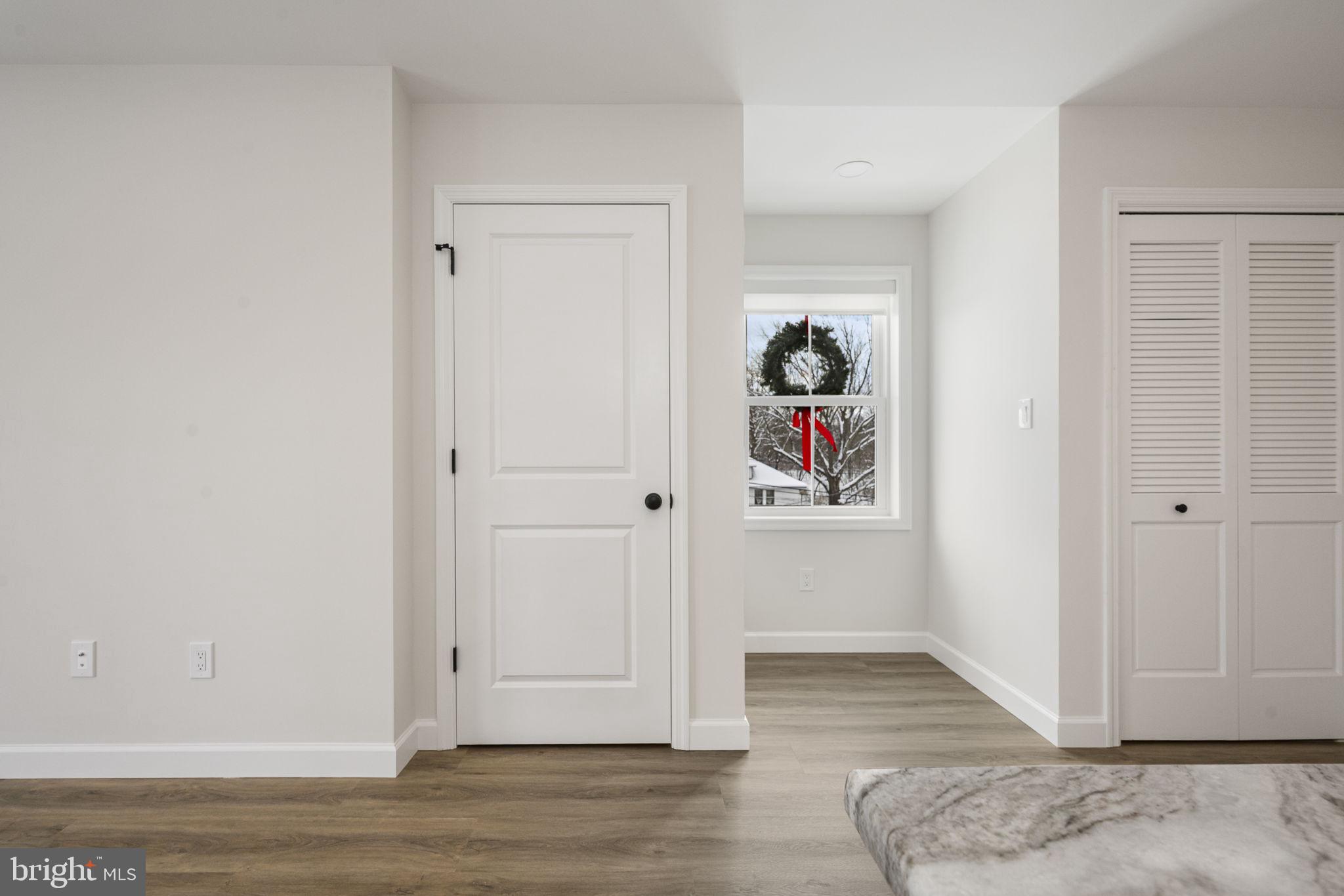 2185 Kimberton Road, Unit 5 Phoenixville, PA 19460 - Photo 33 of 36 a view of a hallway with wooden floor and closet