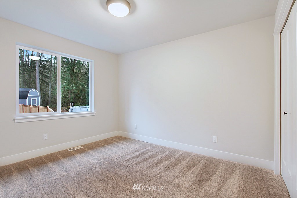 17718 Clover Road Bothell, WA 98012 - Photo 17 of 24 a view of a room that has a window in it