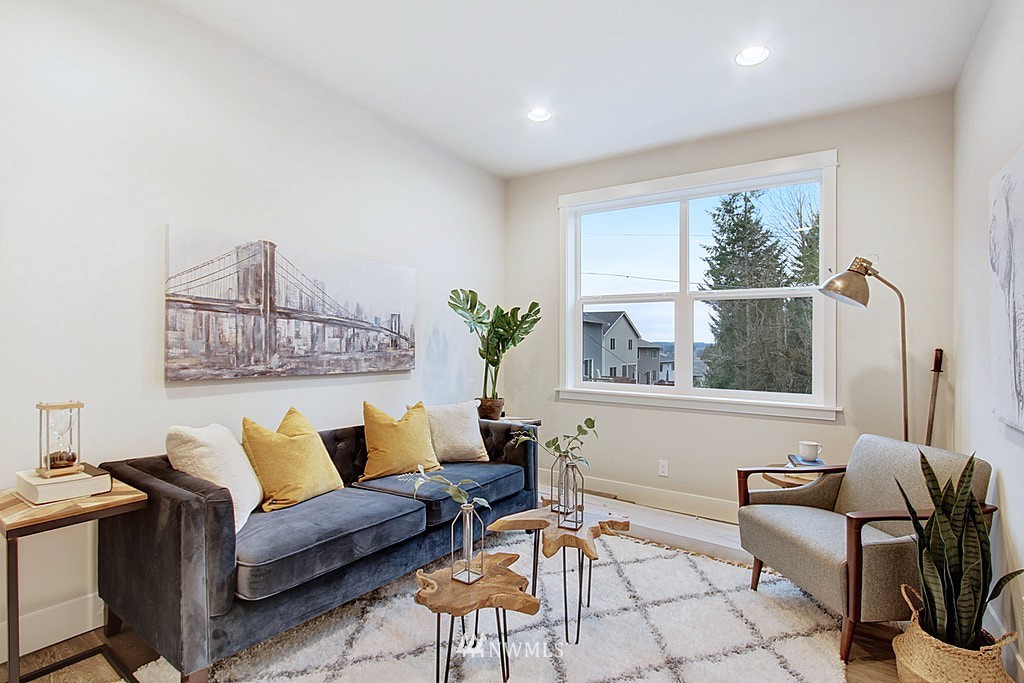 17718 Clover Road Bothell, WA 98012 - Photo 10 of 24 a living room with furniture and a window