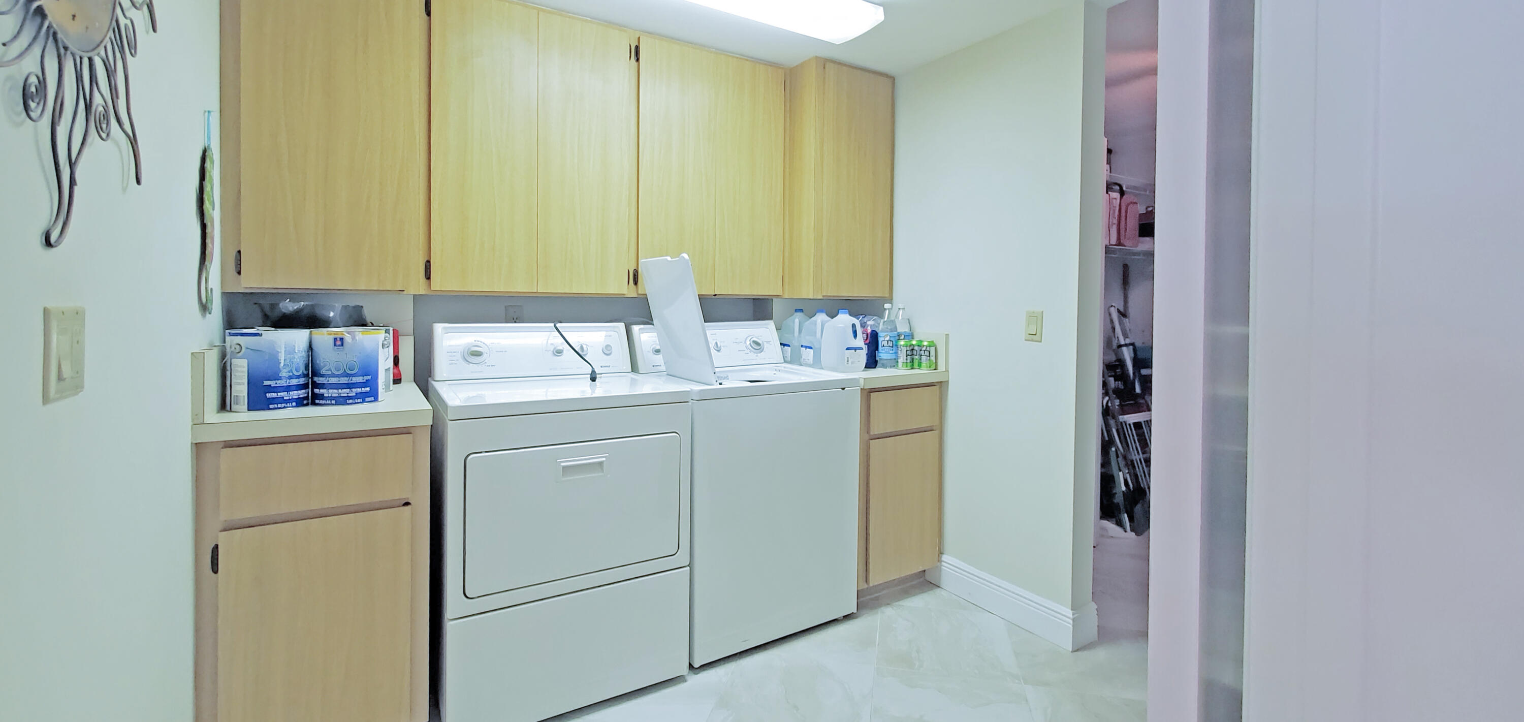 401 Ocean Bluffs Boulevard, Unit 104 Jupiter, FL 33477 - Photo 10 of 15 Laundry