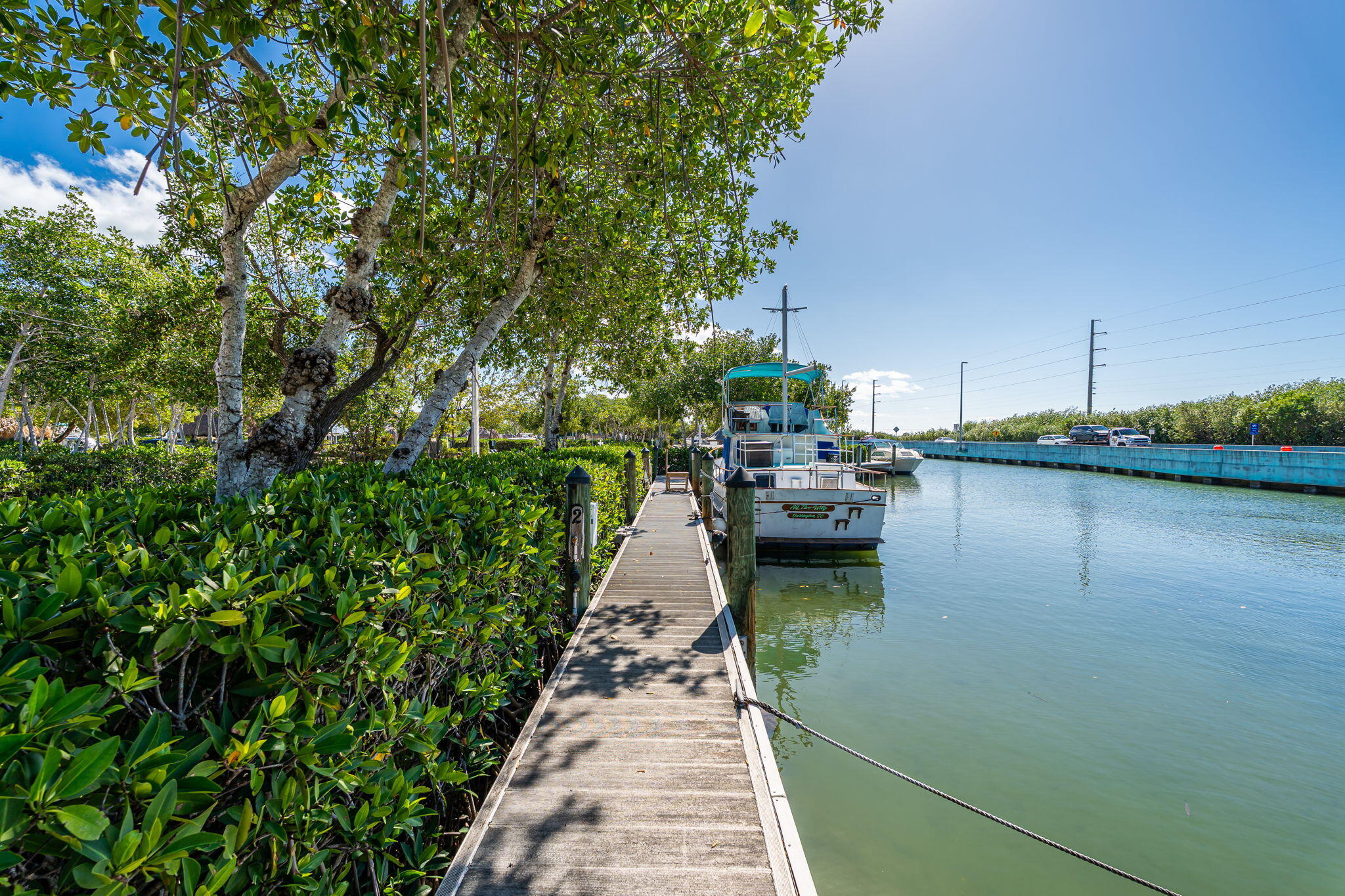 100 Morris Lane Key Largo, FL 33037 - Photo 109 of 192 a view of a lake with cars parked
