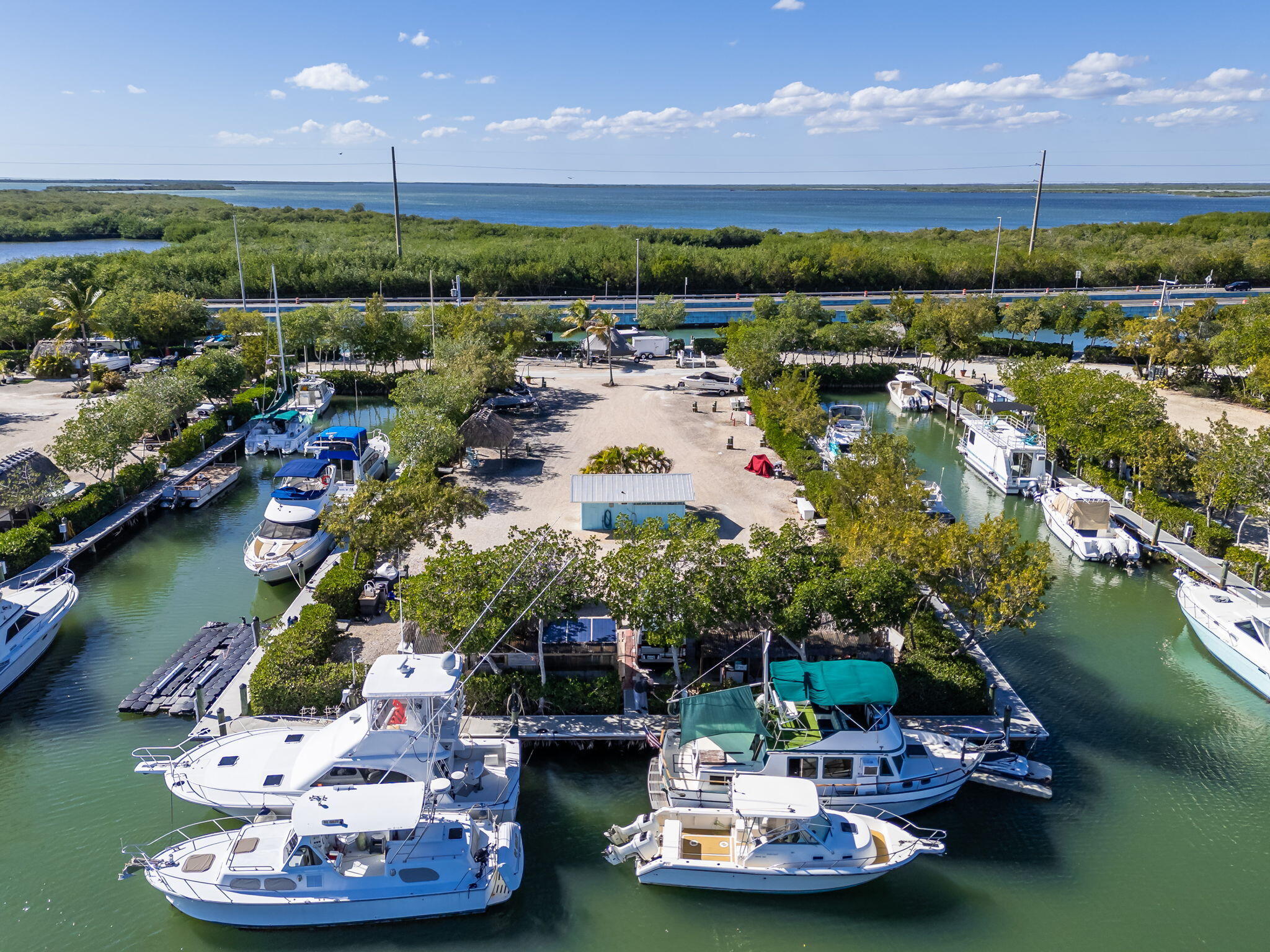100 Morris Lane Key Largo, FL 33037 - Photo 11 of 192 a view of a lake with a mountain in the background