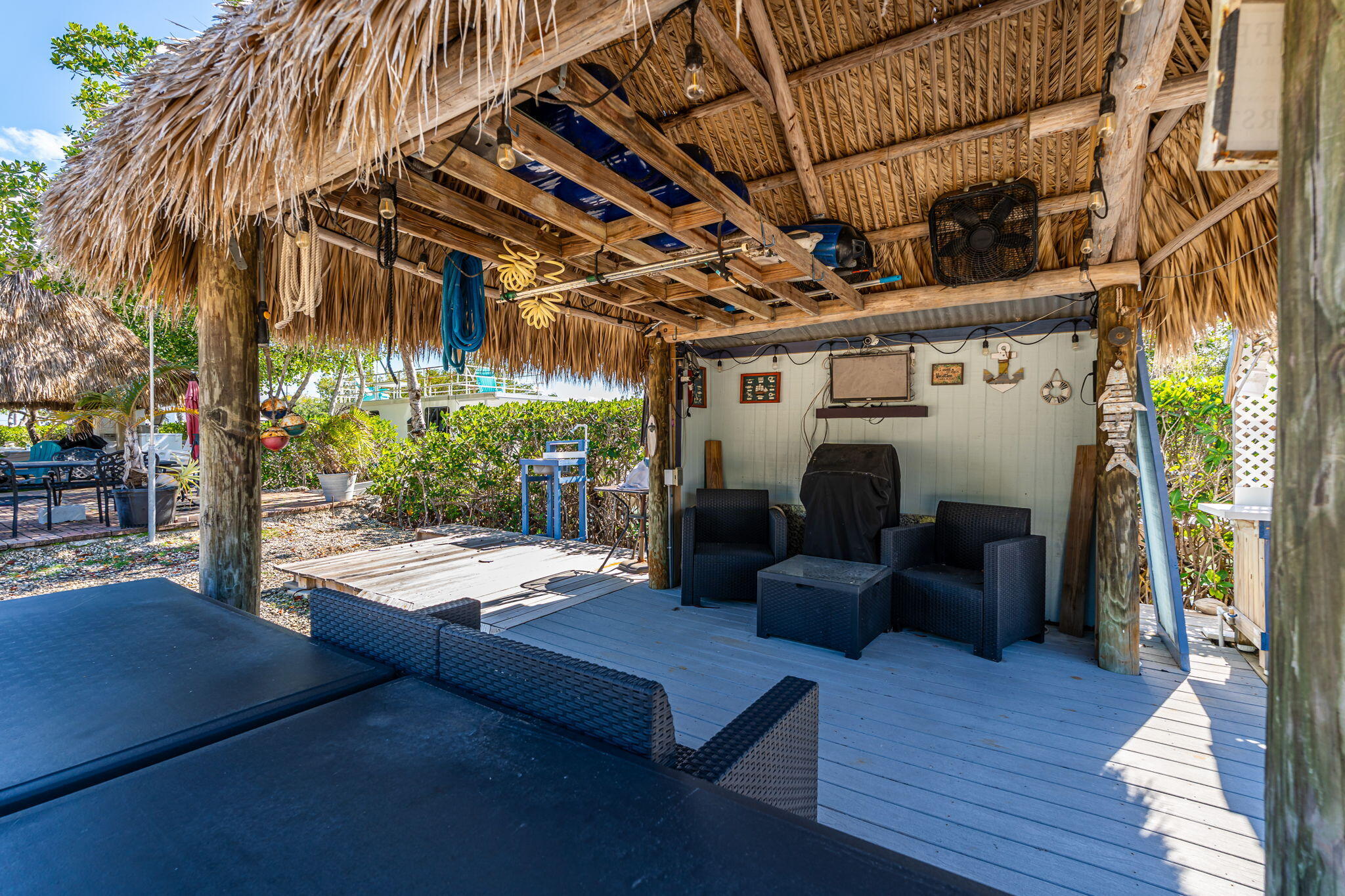 100 Morris Lane Key Largo, FL 33037 - Photo 117 of 192 a view of a porch with furniture and a patio