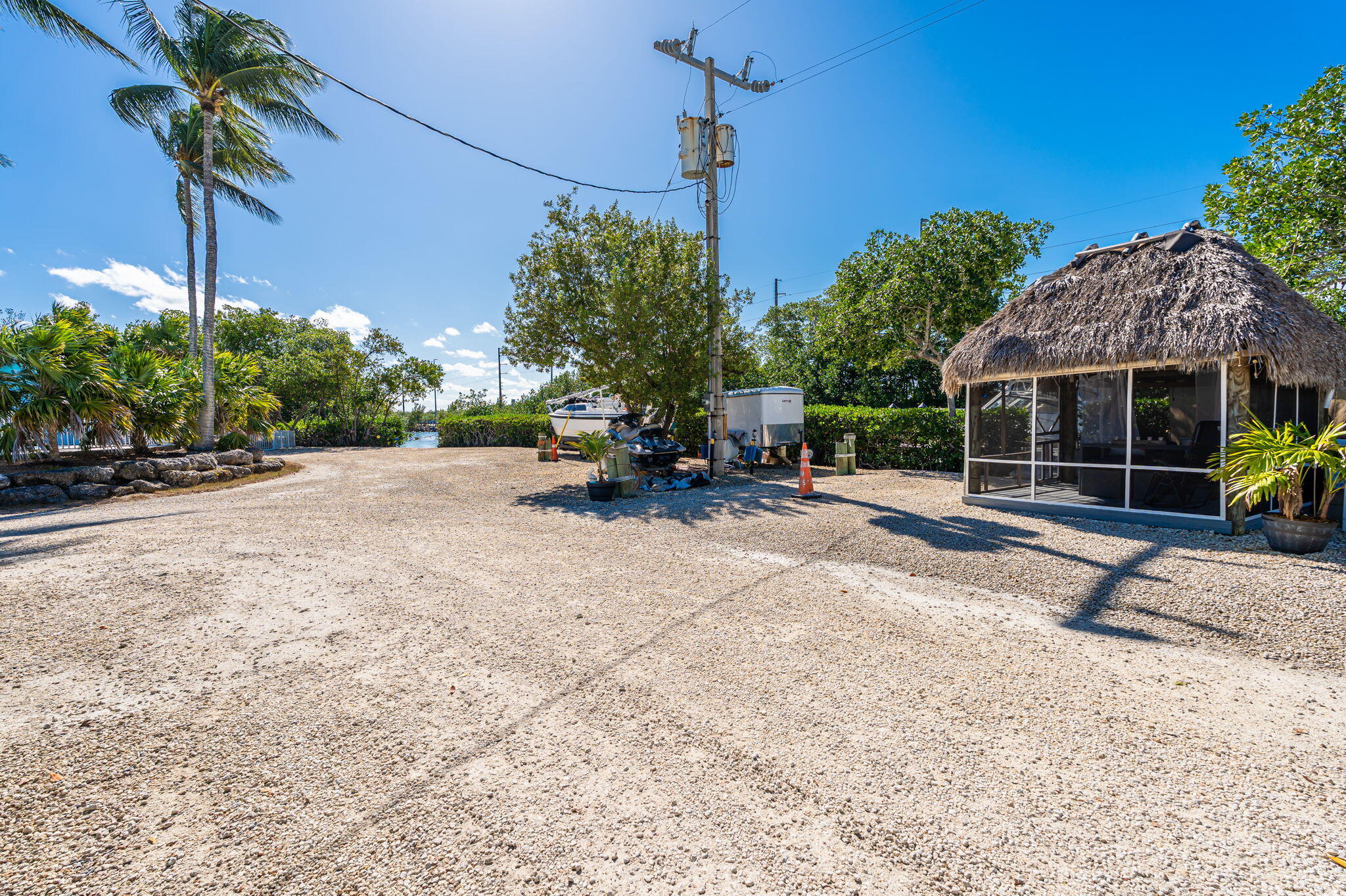 100 Morris Lane Key Largo, FL 33037 - Photo 150 of 192 a view of a house with backyard and sitting area