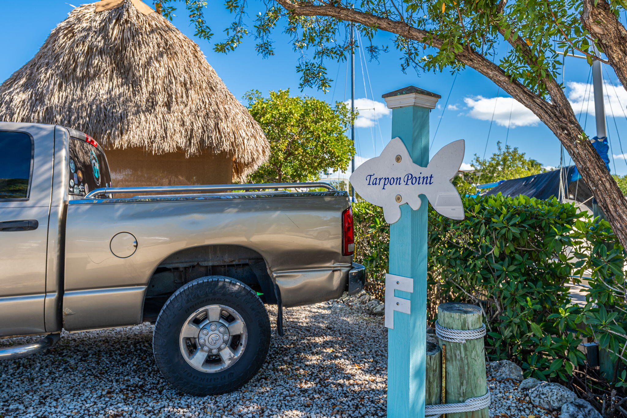 100 Morris Lane Key Largo, FL 33037 - Photo 152 of 192 a front view of a house with garden space and parking