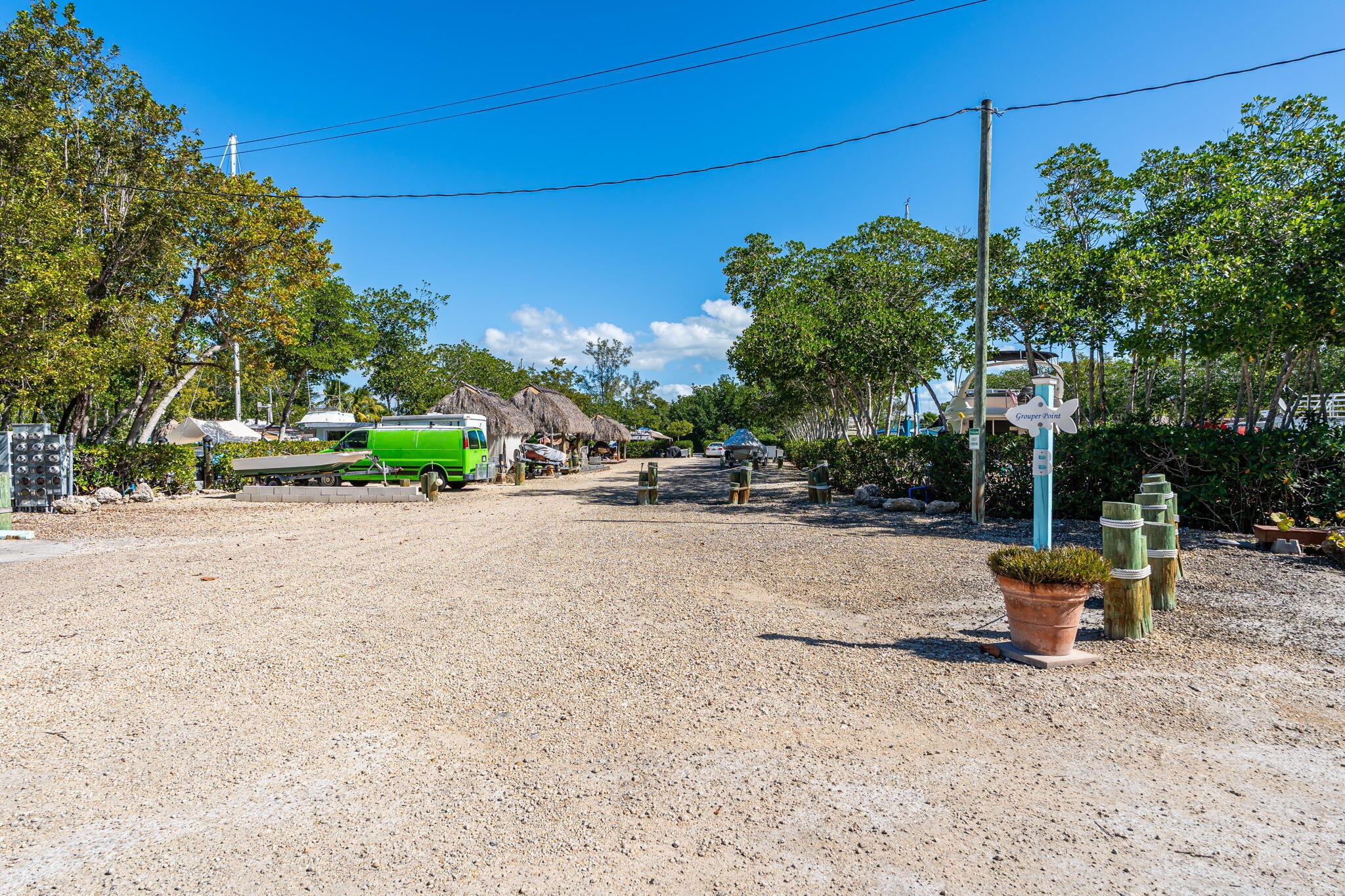 100 Morris Lane, Unit 56 SLIPS Key Largo, FL 33037 - Photo 21 of 56 a view of backyard with outdoor seating and trees