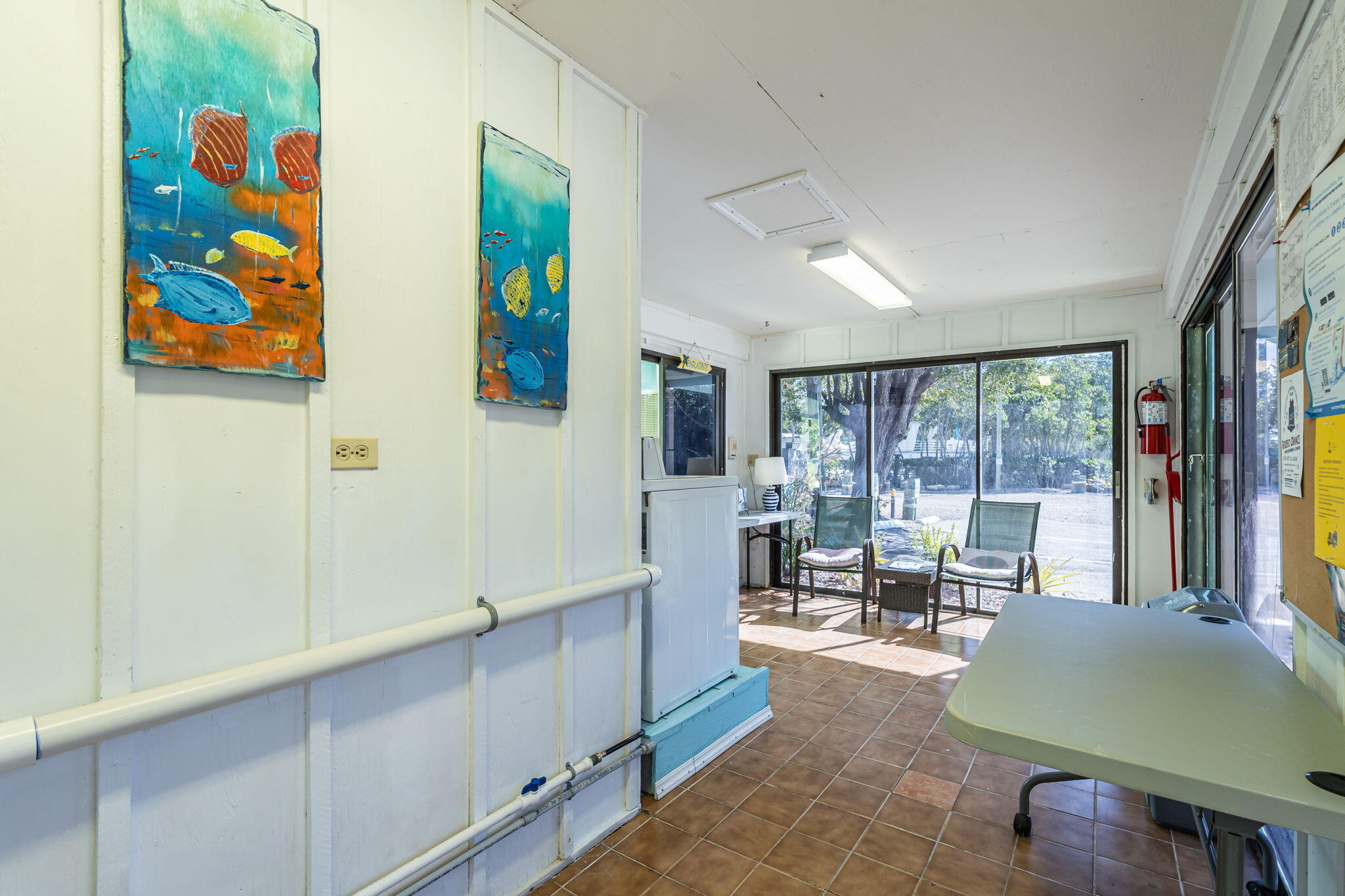 100 Morris Lane Key Largo, FL 33037 - Photo 56 of 192 a living room with furniture and a large window