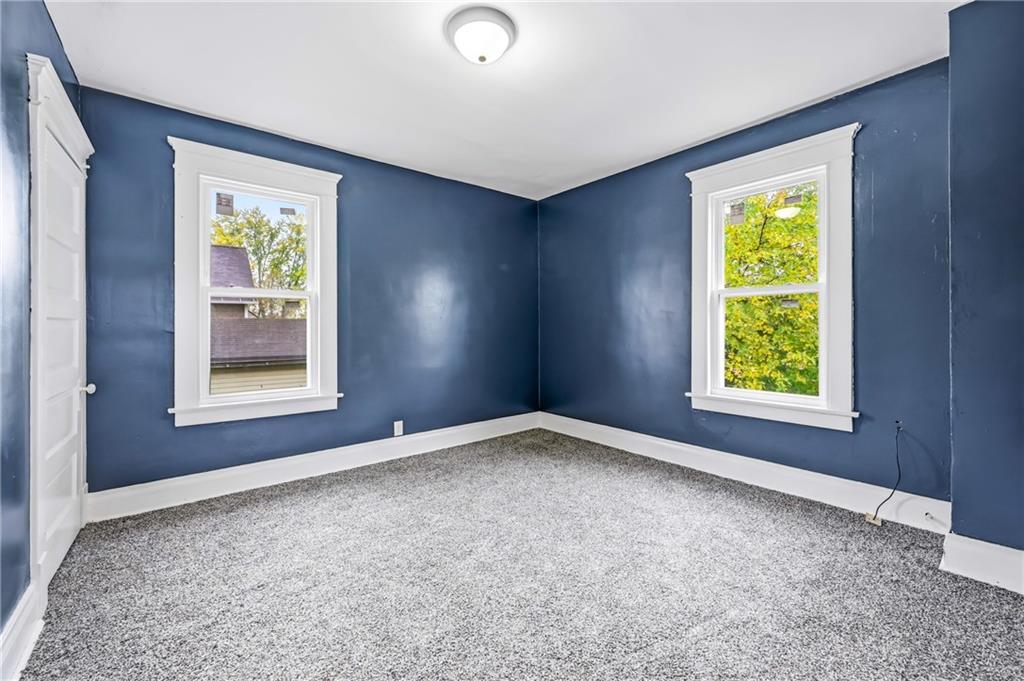 522 Wallis Avenue Farrell, PA 16121 - Photo 15 of 24 a view of an empty room with a window