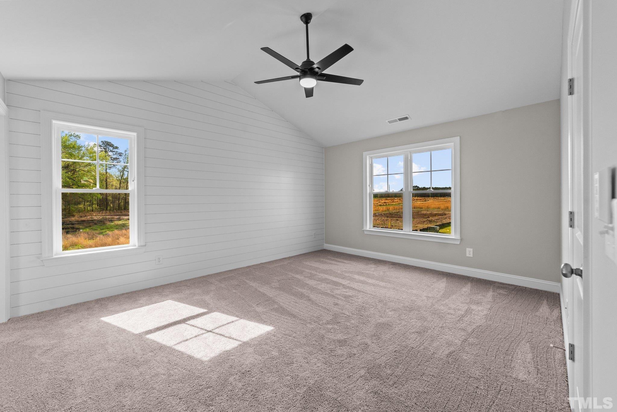 4530 Fairhaven Drive Wilson, NC 27893 - Photo 18 of 49 an empty room with windows and ceiling fan
