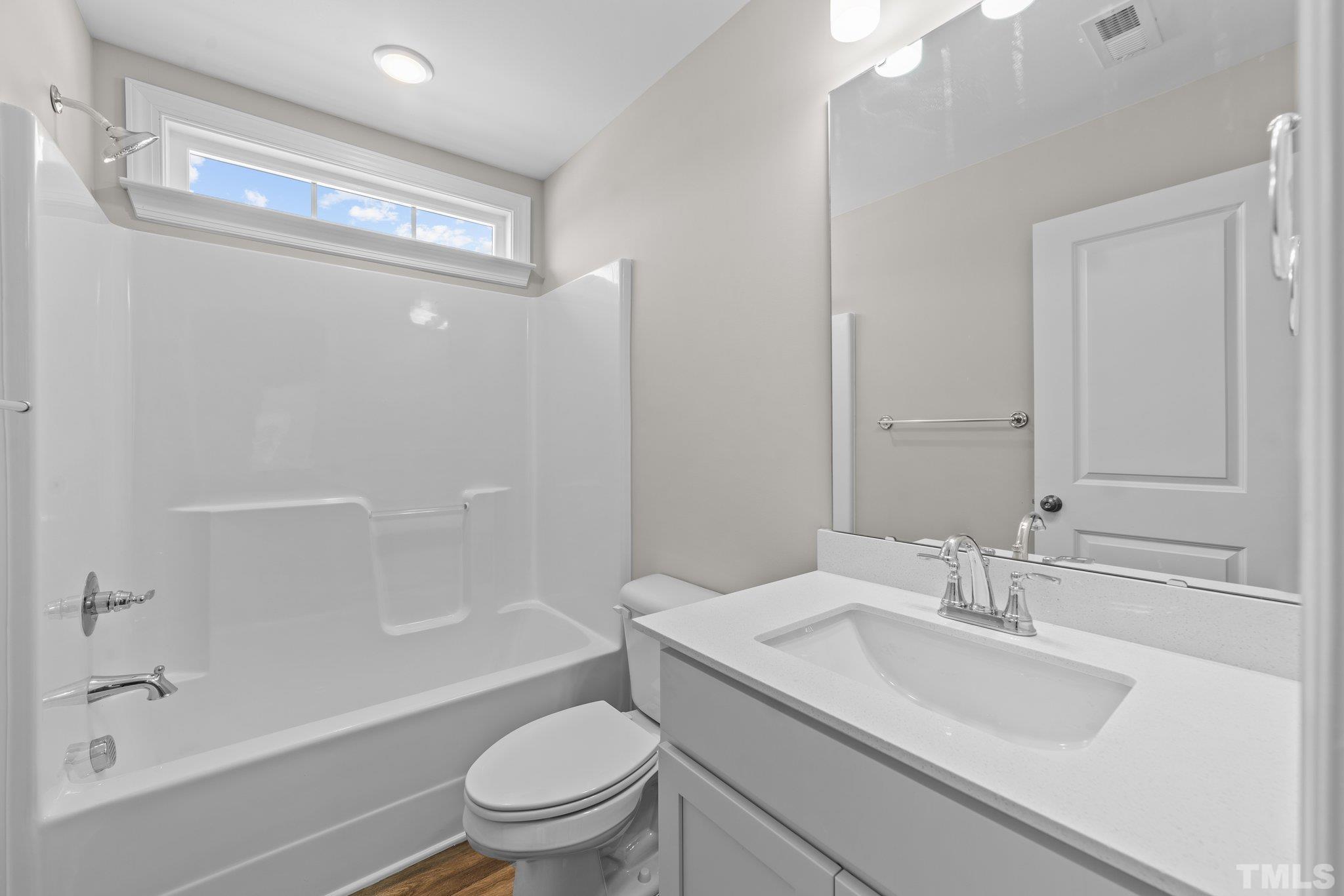 4530 Fairhaven Drive Wilson, NC 27893 - Photo 29 of 49 a bathroom with a sink toilet and shower